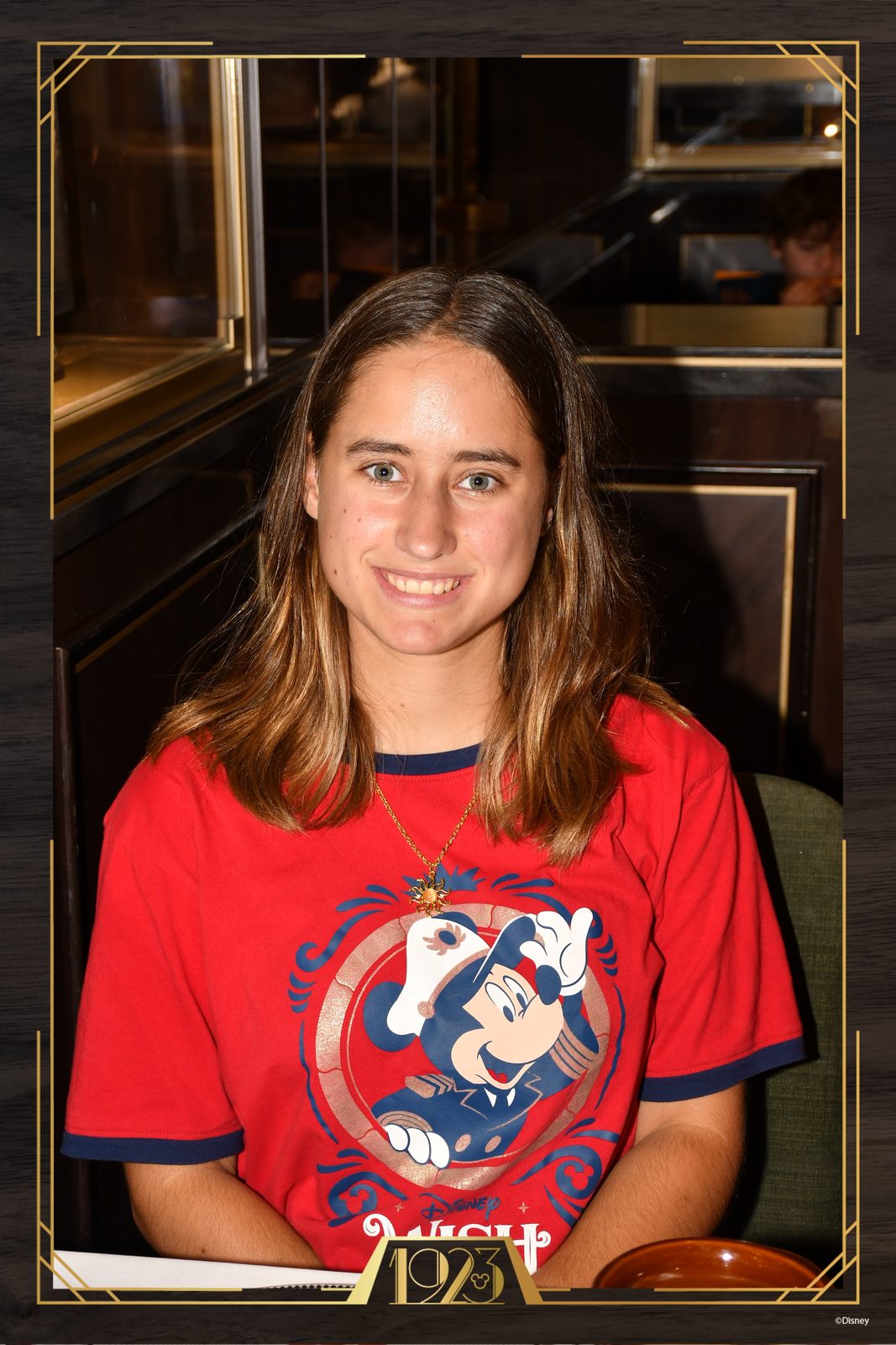 Lisa's portrait in her Disney Wish shirt