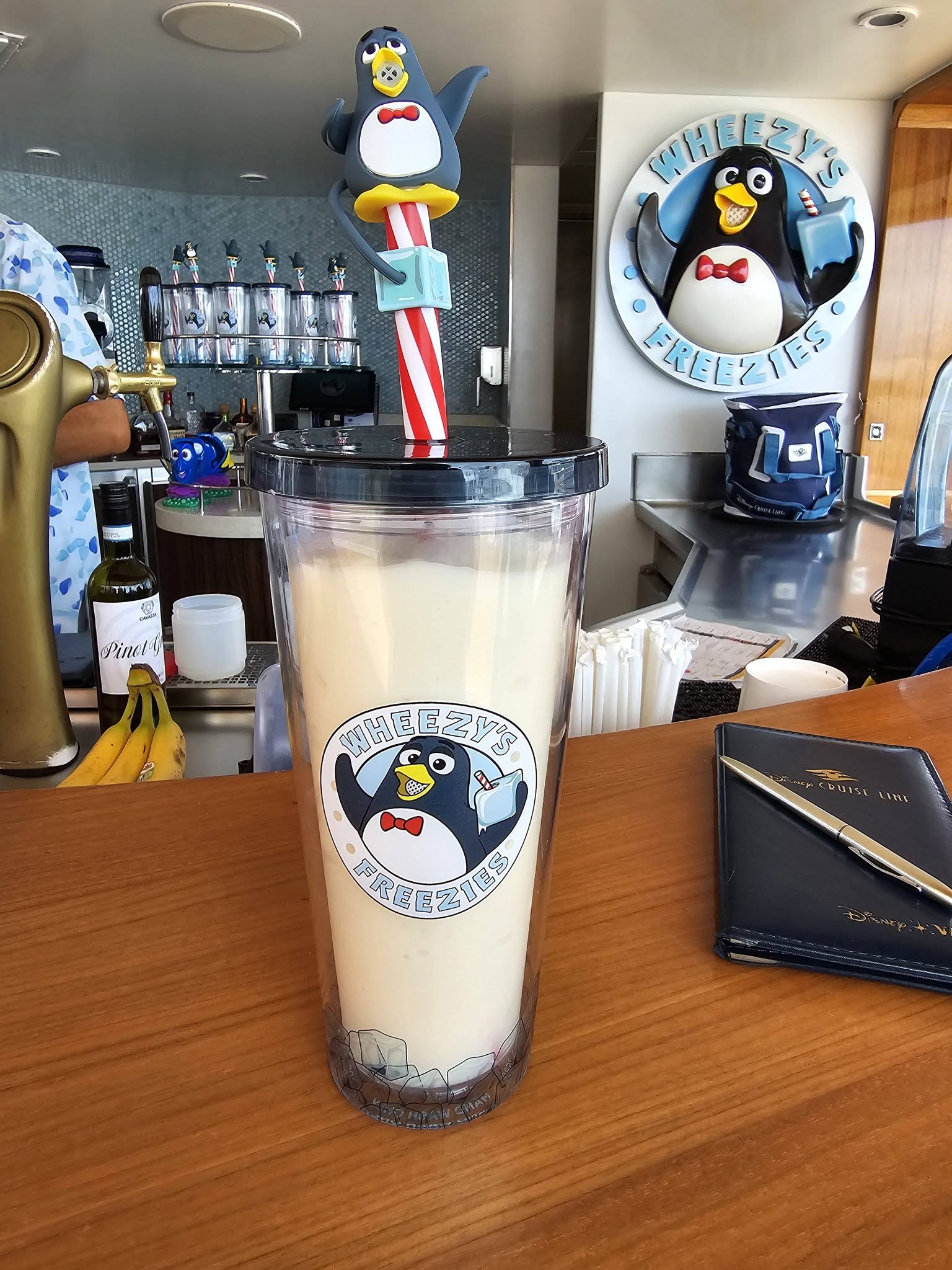 Kathy's pina colada at Wheezy's Freezies, she envied Thomas's topper and wanted her own.