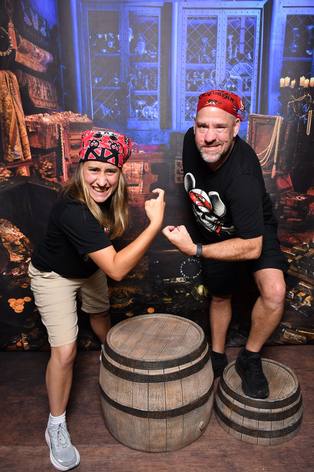 Kathy and Thomas fist bump in the treasure room