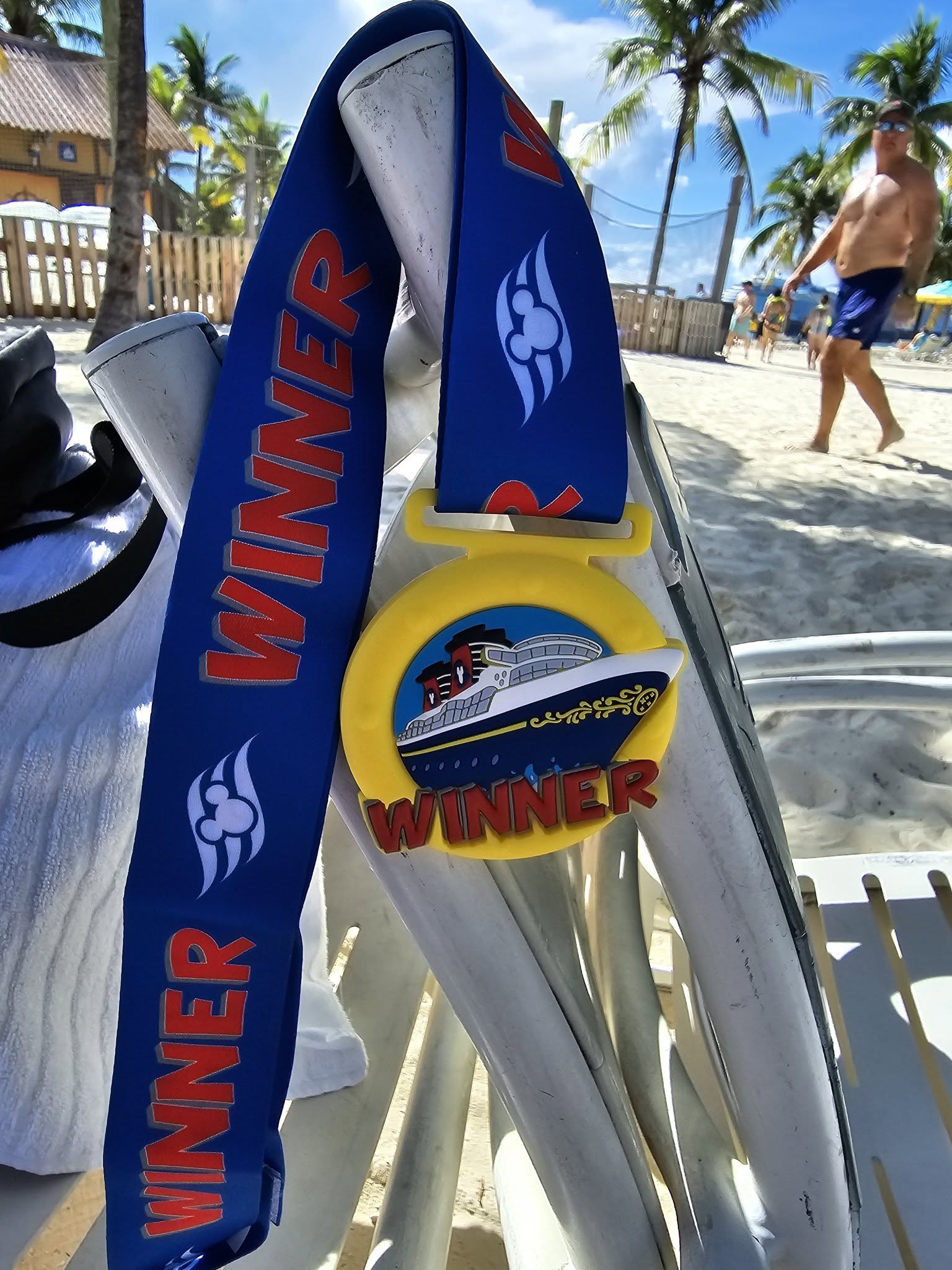 Kathy's medal from the Castaway Cay 5K