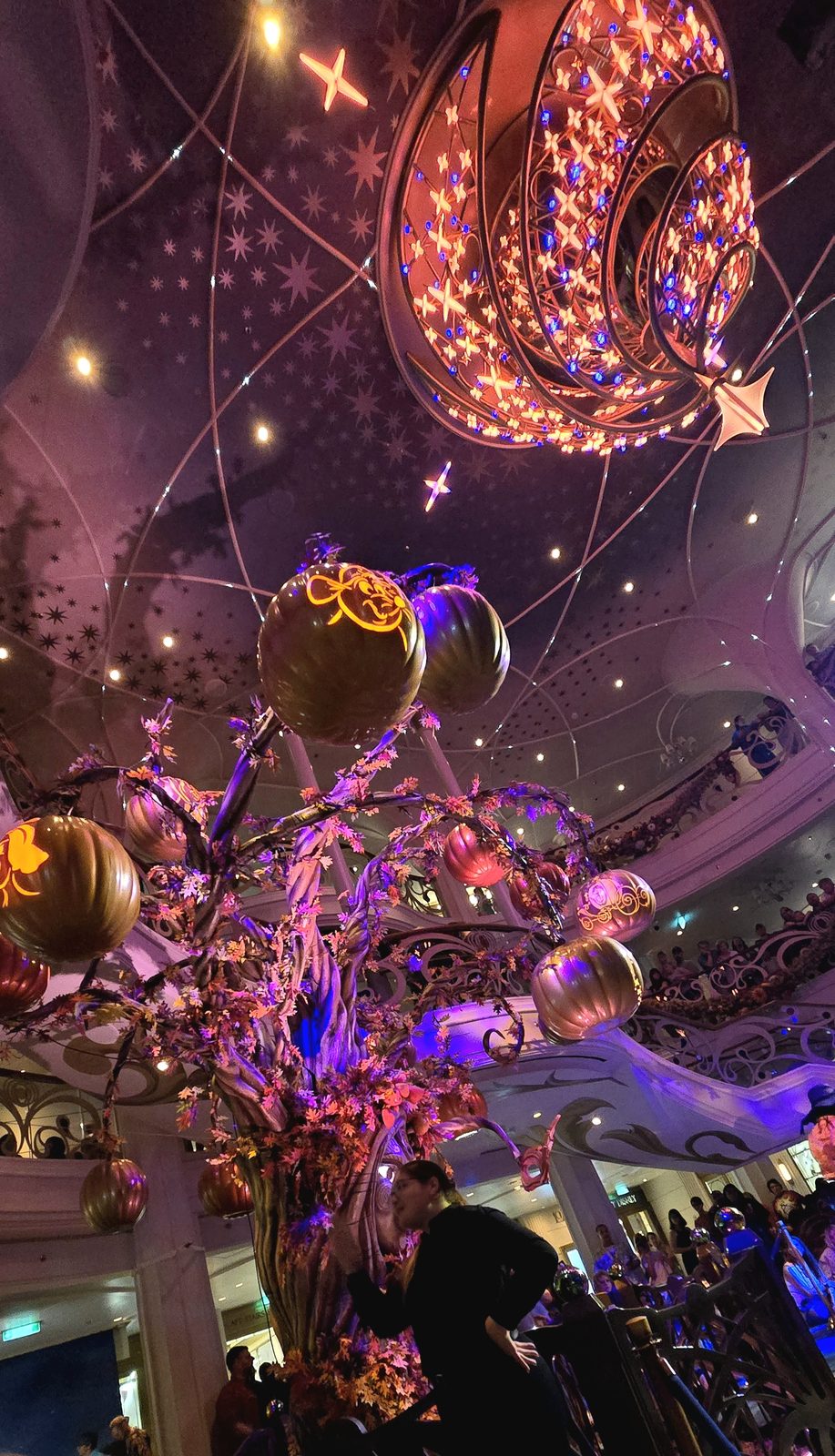Boo the Pumpkin Tree lit up in the Grand Hall for Halloween on the High Seas