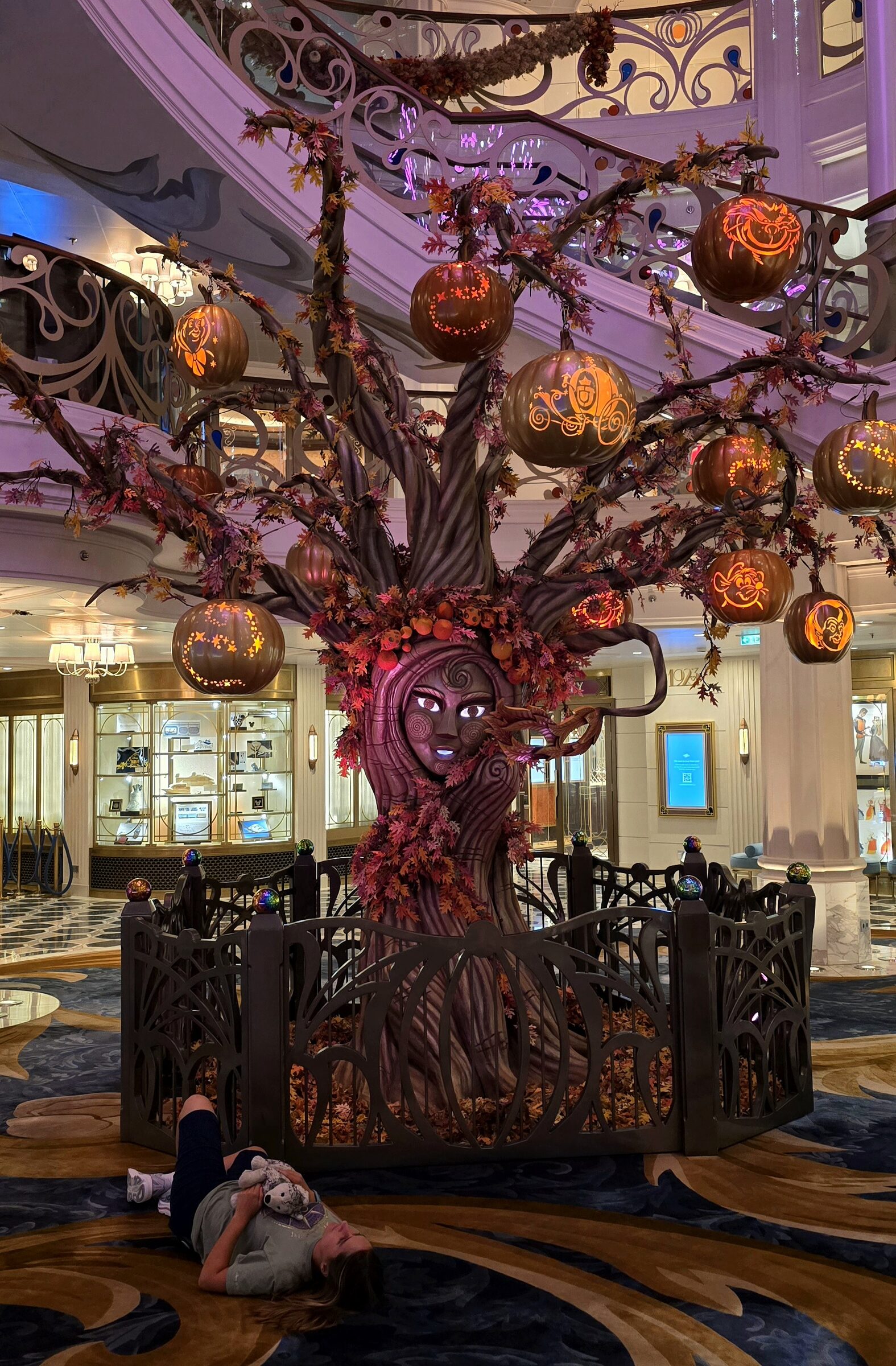 Boo the Pumpkin Tree glowing in the Grand Hall at night