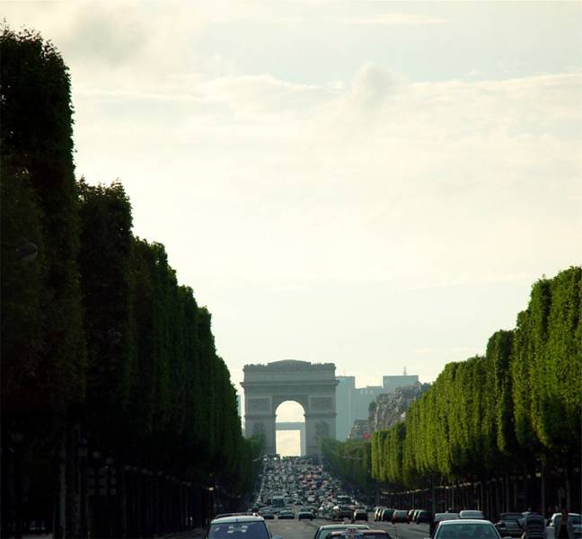 Walking down the Champs-Elysees toward the Arc de Triomphe