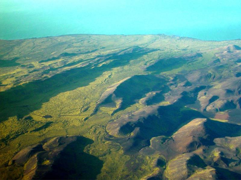 Iceland's volcanic landscape from the plane window