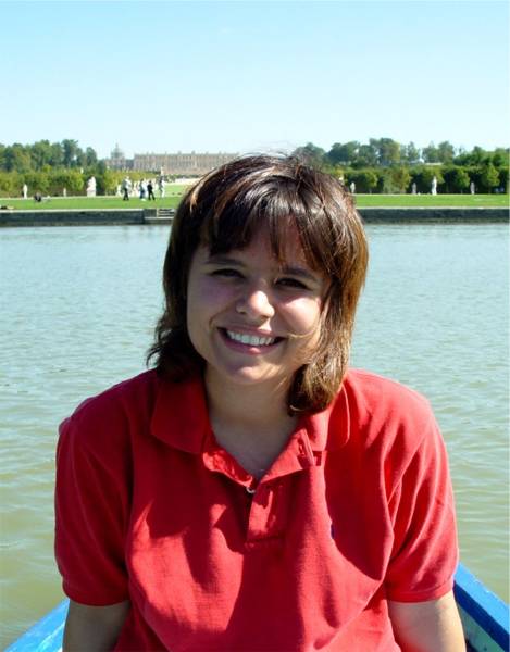 Kathy on our rowboat on the canal at Versailles