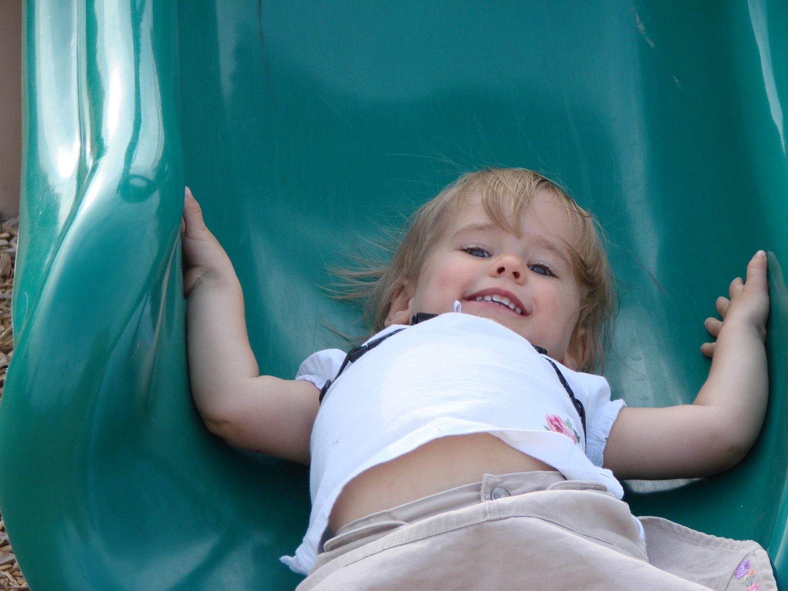 Lisa sliding down laughing