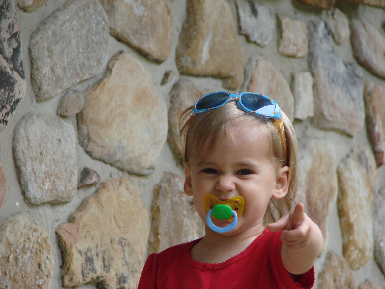 Lisa with her sunglasses and pacifier