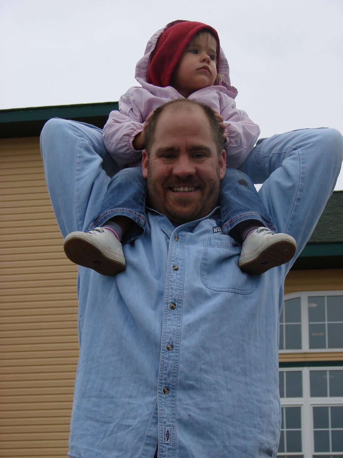 Lisa riding on my shoulders
