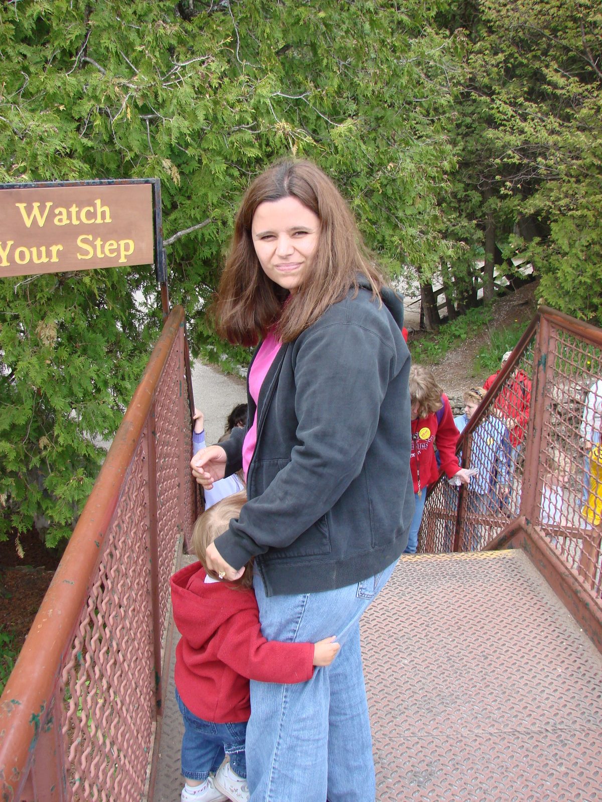 Kathy holds Lisa on the boardwalk