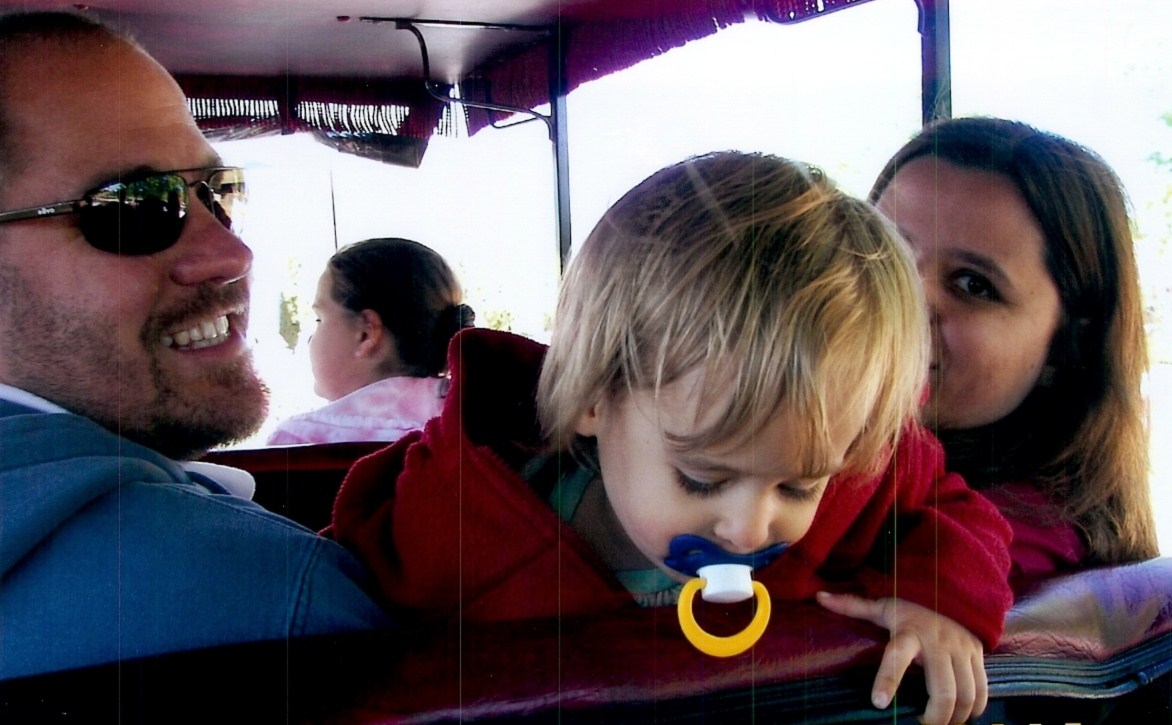 Lisa rides along on the carriage with us
