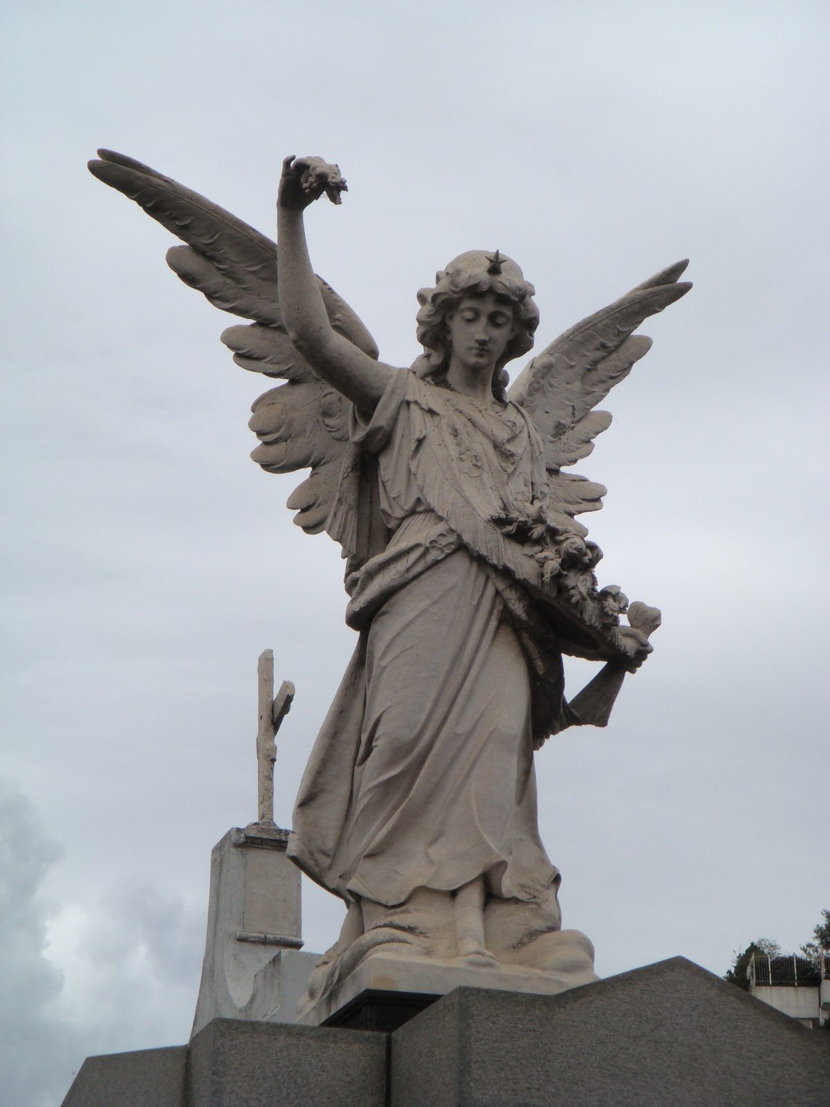 A carved angel watching over Recoleta