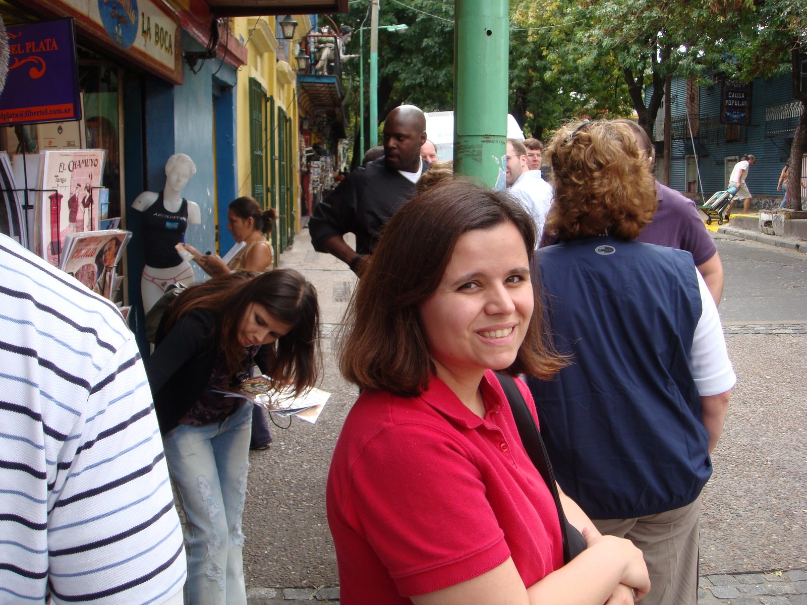 Browsing a street vendor's stall in La Boca