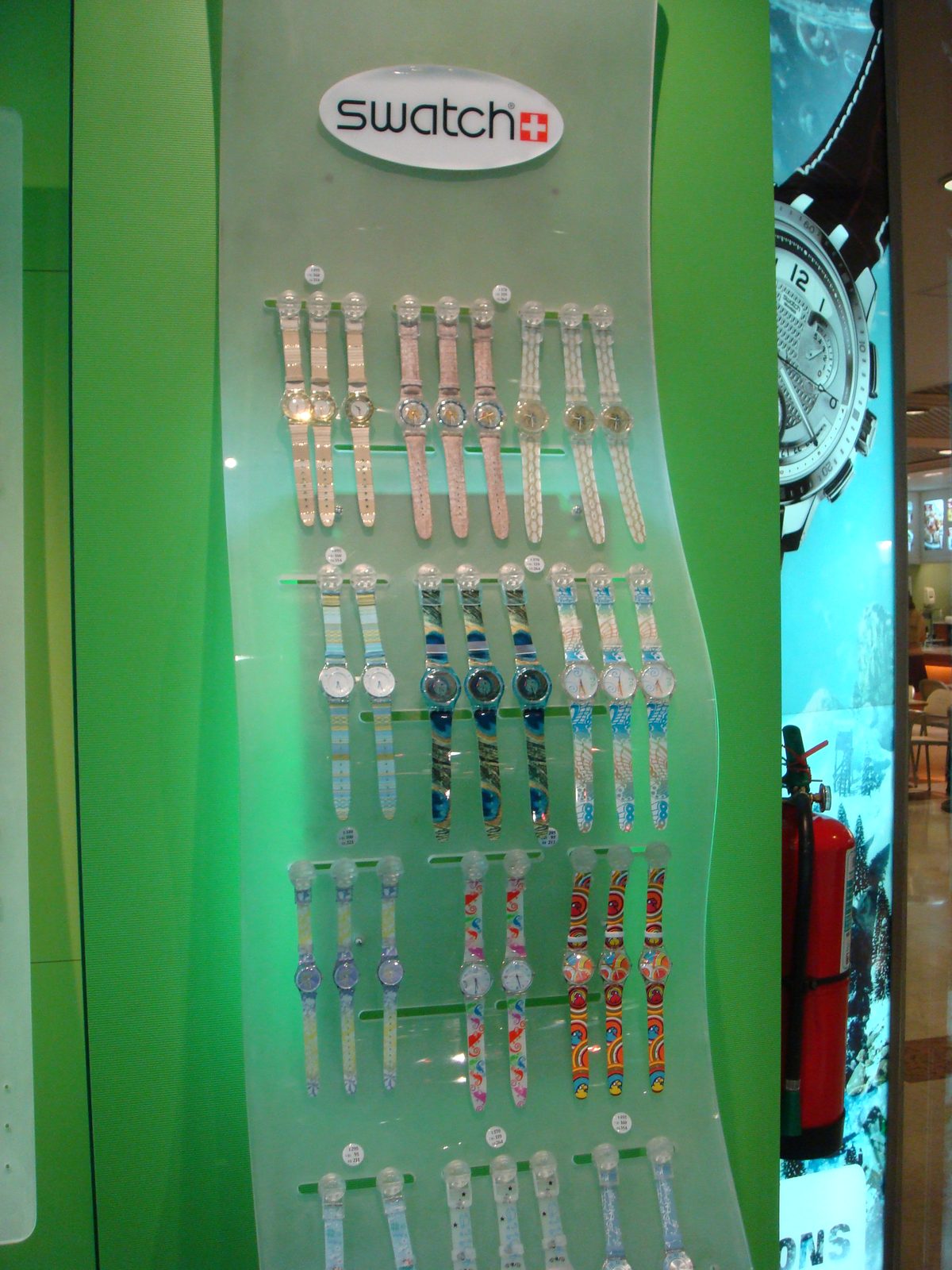 A Swatch store window downtown