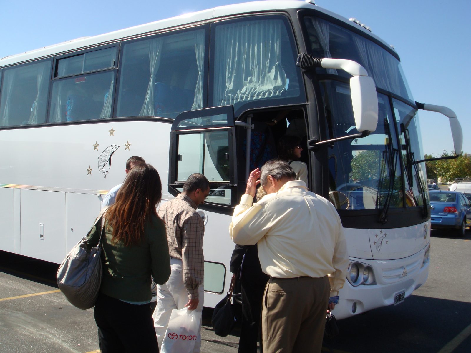 Boarding the bus with the team