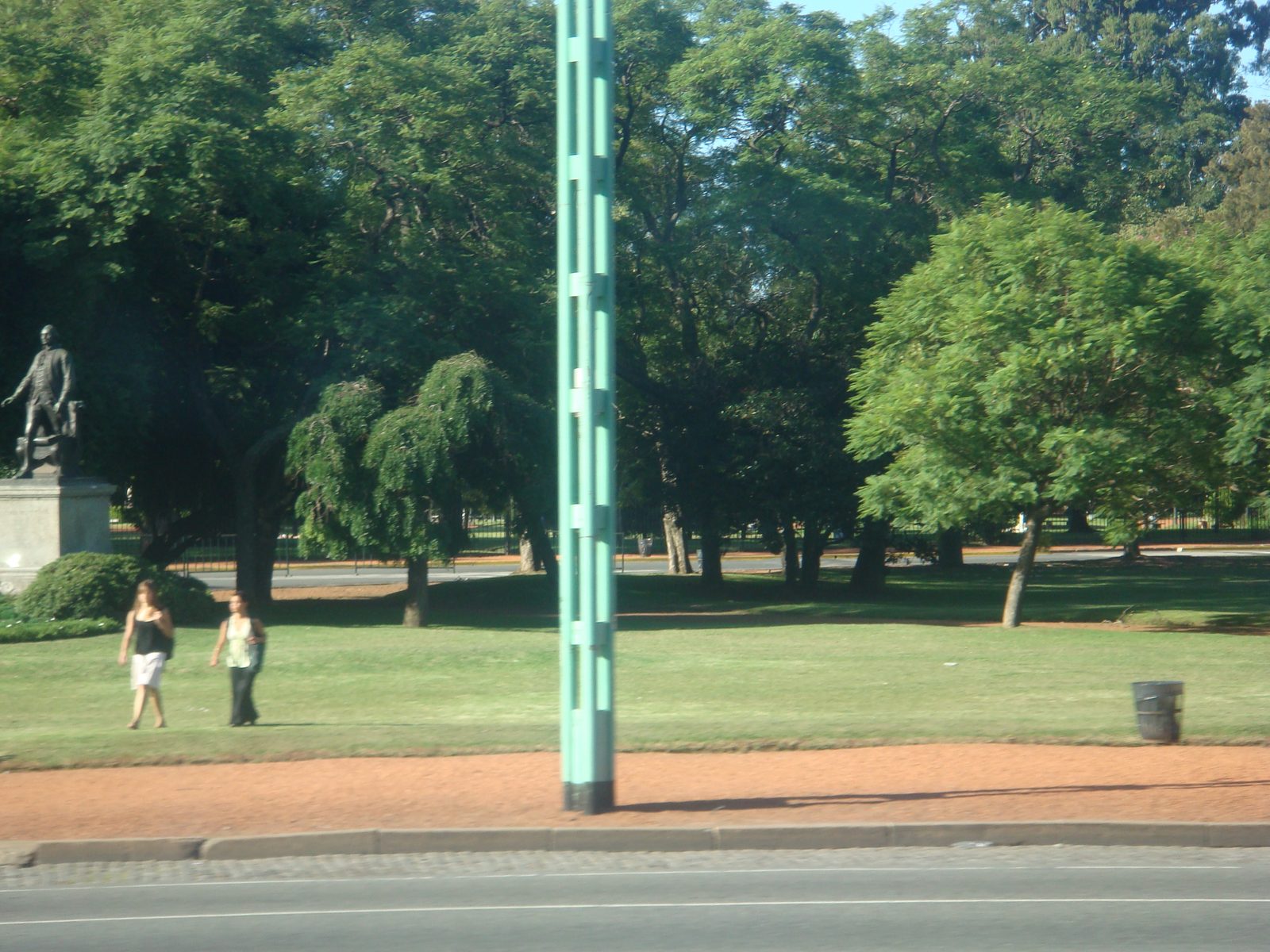 A smaller statue near the monument's base