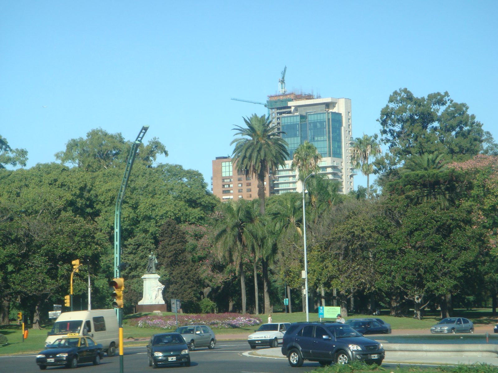 Palm trees lining the park around the monument