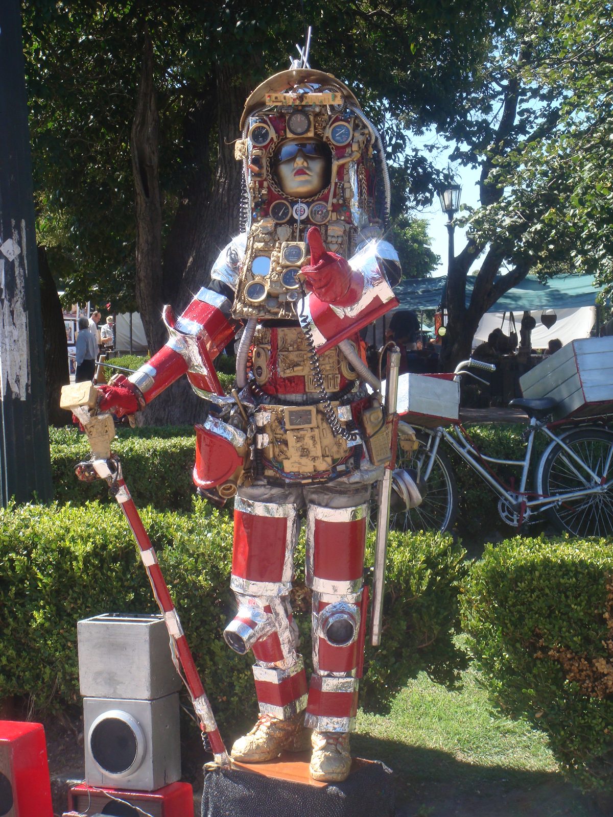 A costumed street performer near the plaza