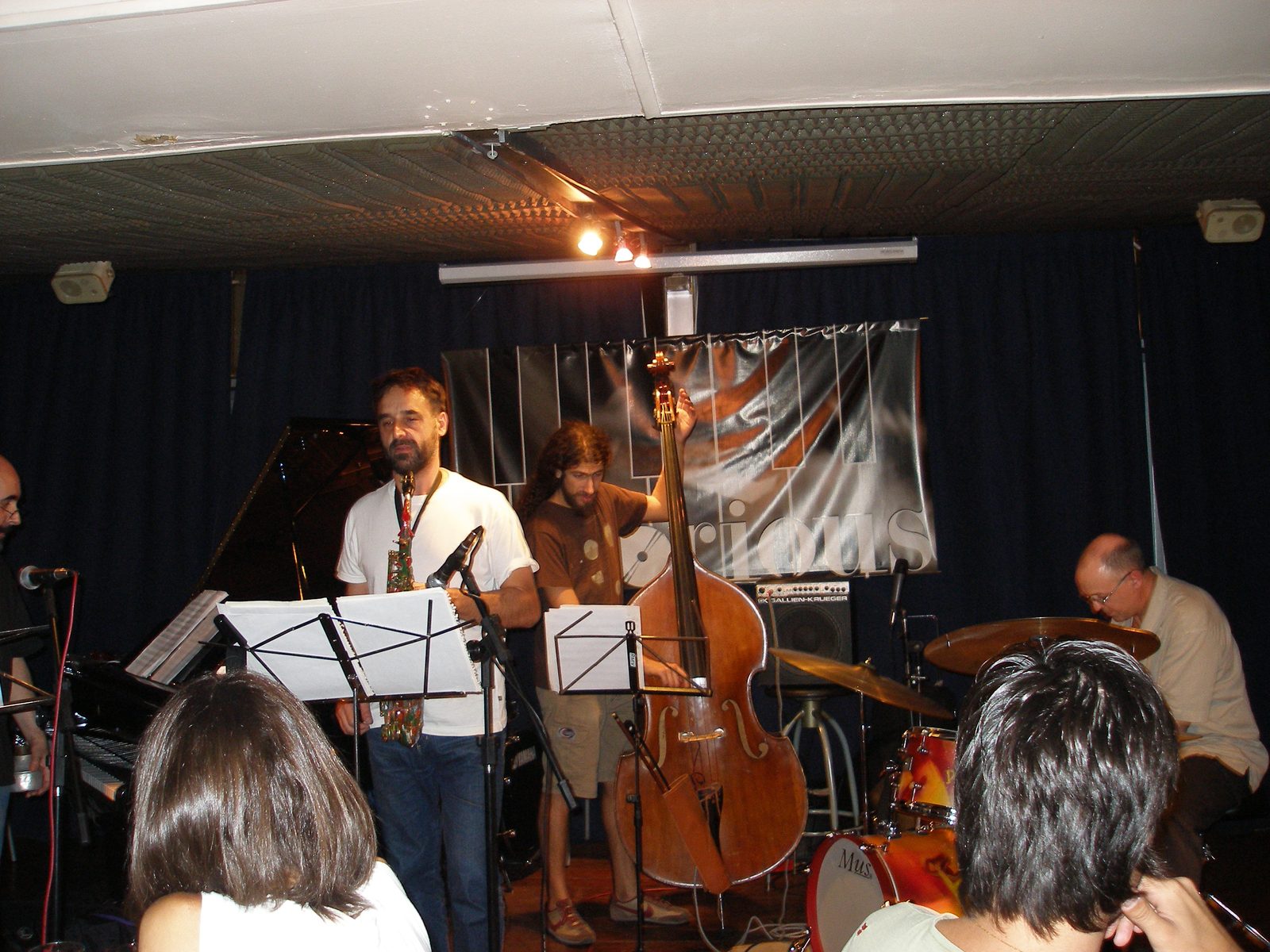 A trio on guitar, bass and drums at the club we found