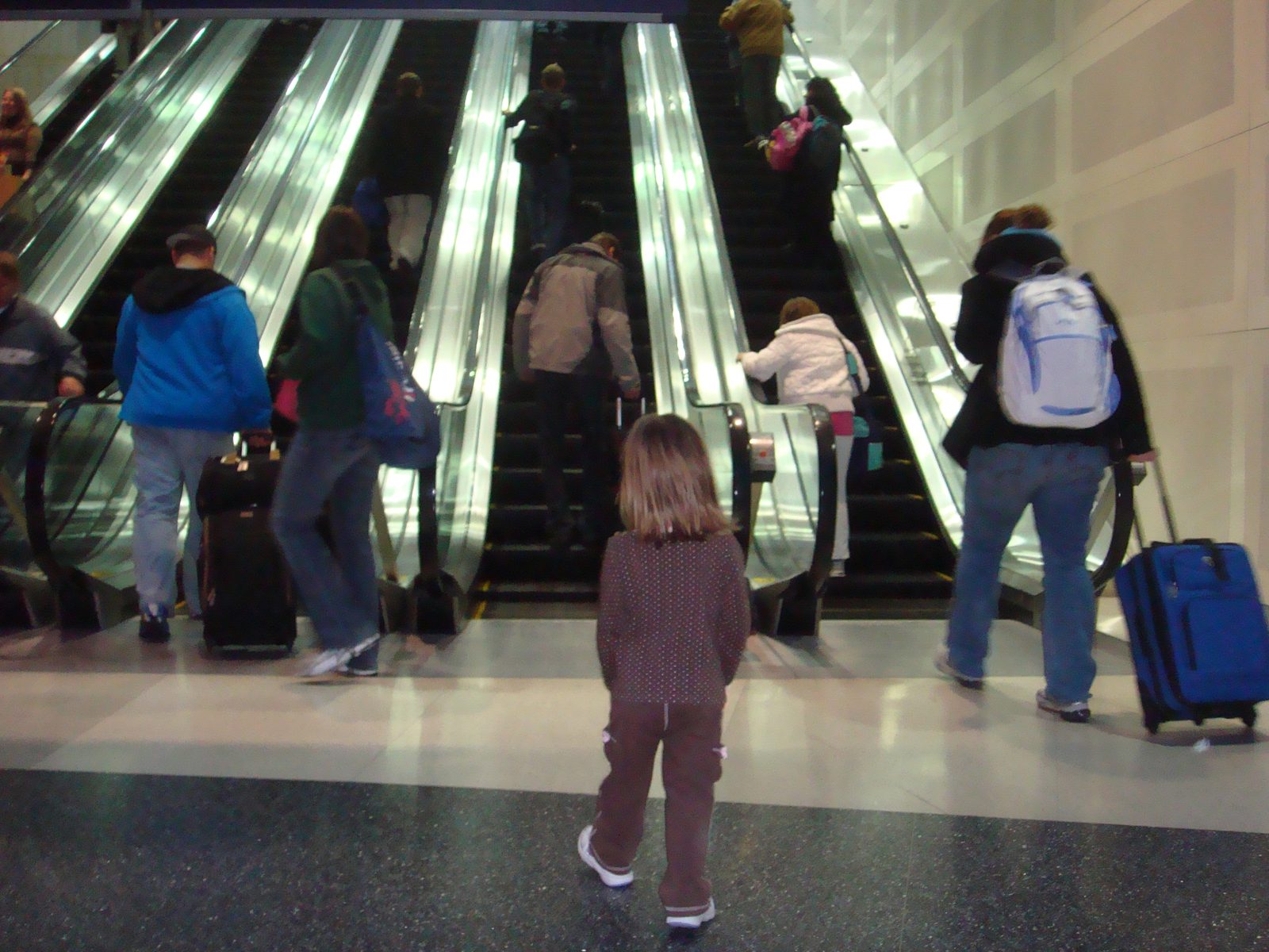 Lisa watching the escalator