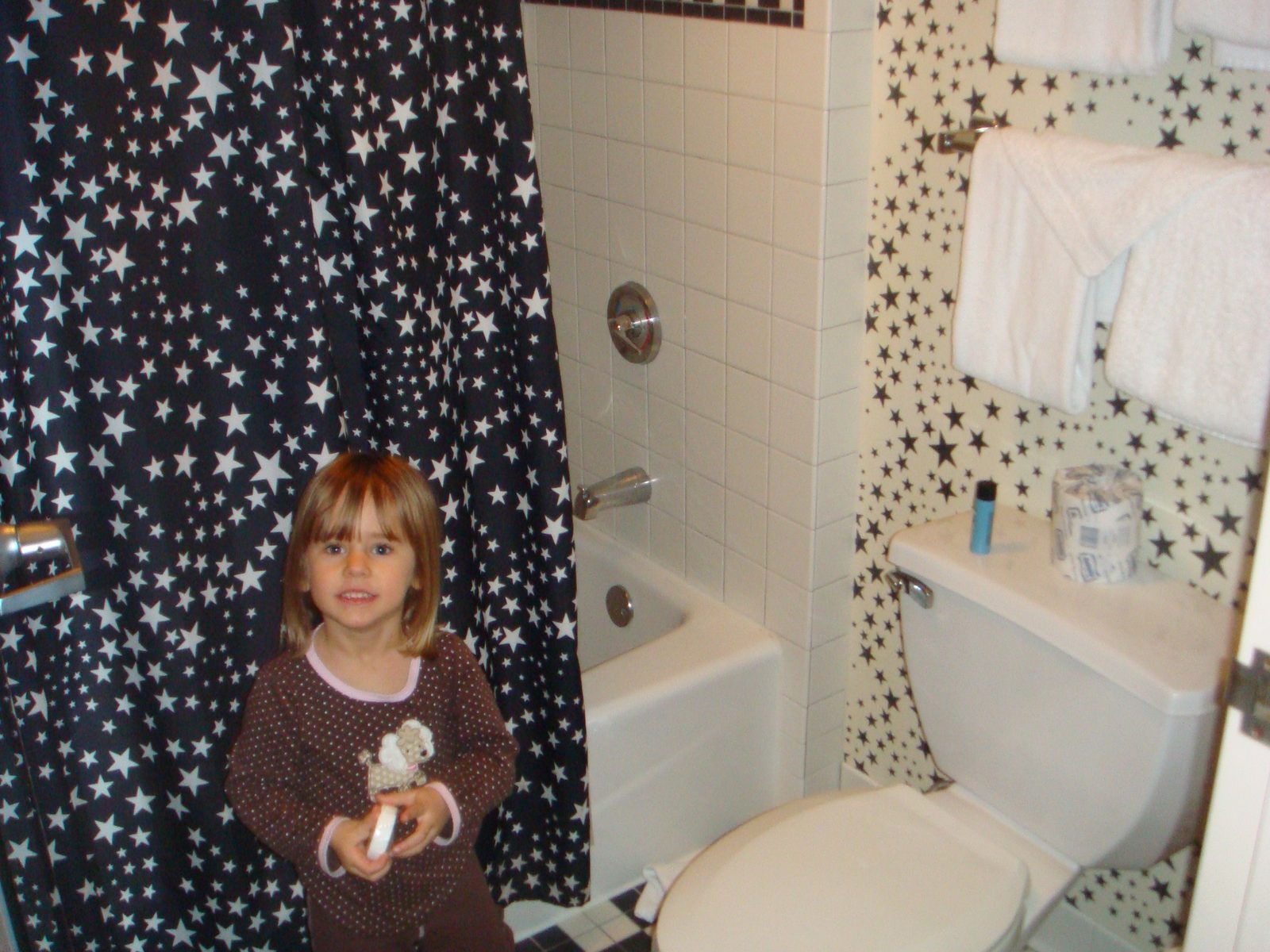 Lisa ready for bed under the star shower curtain