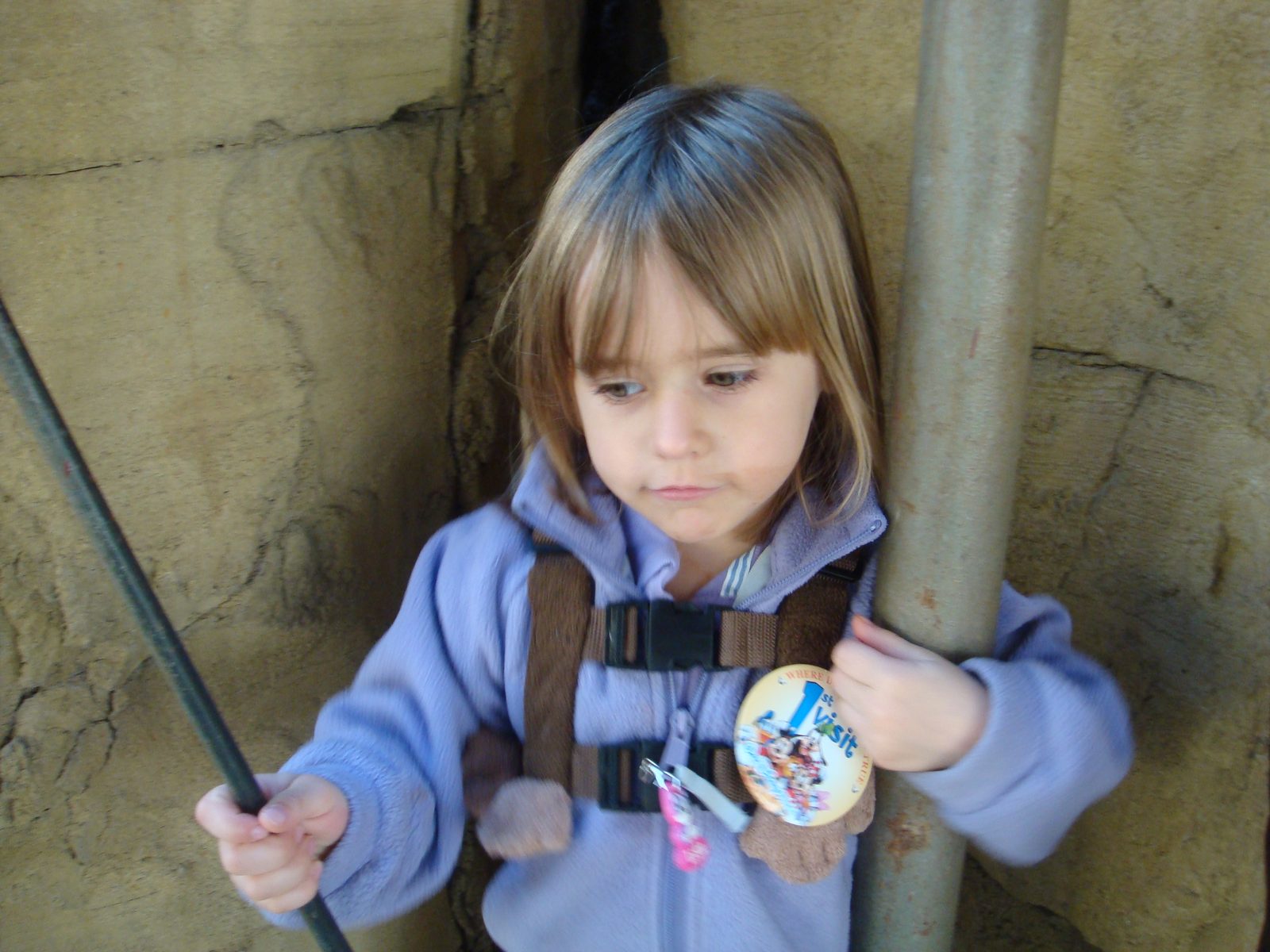 Lisa on a rope swing at the playground