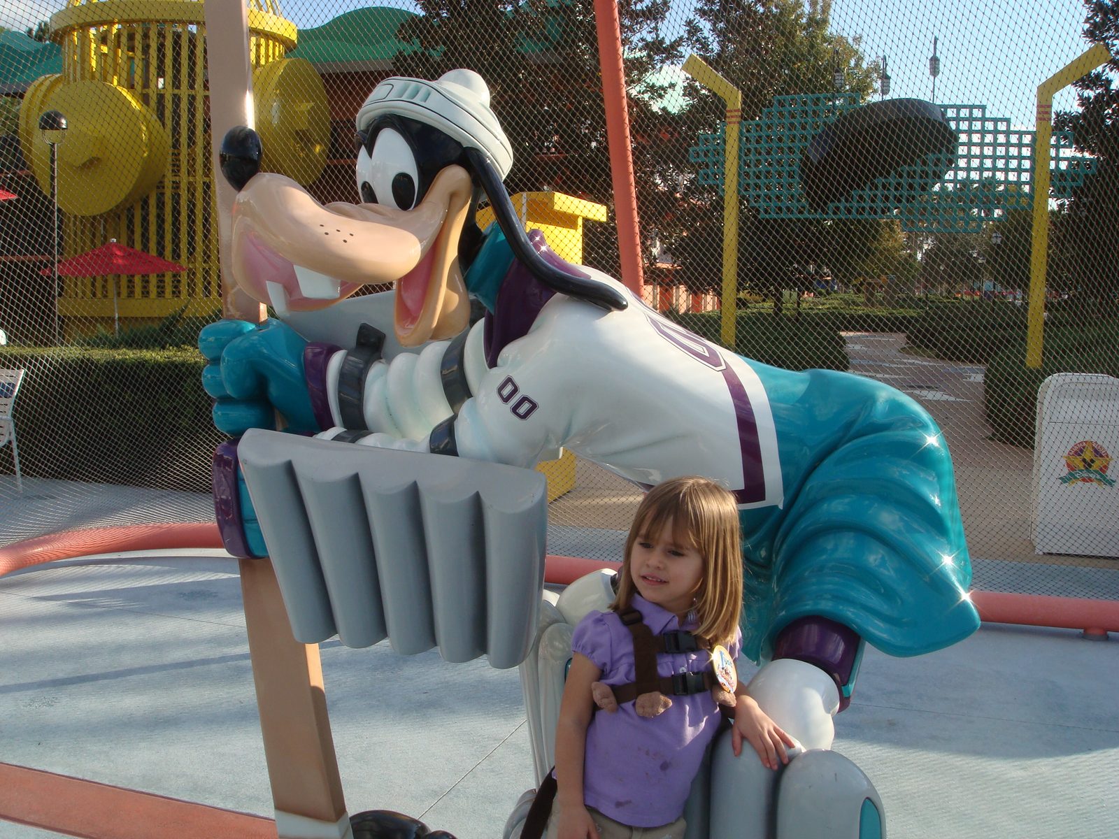 Lisa on the Goofy playground sculpture back at the resort