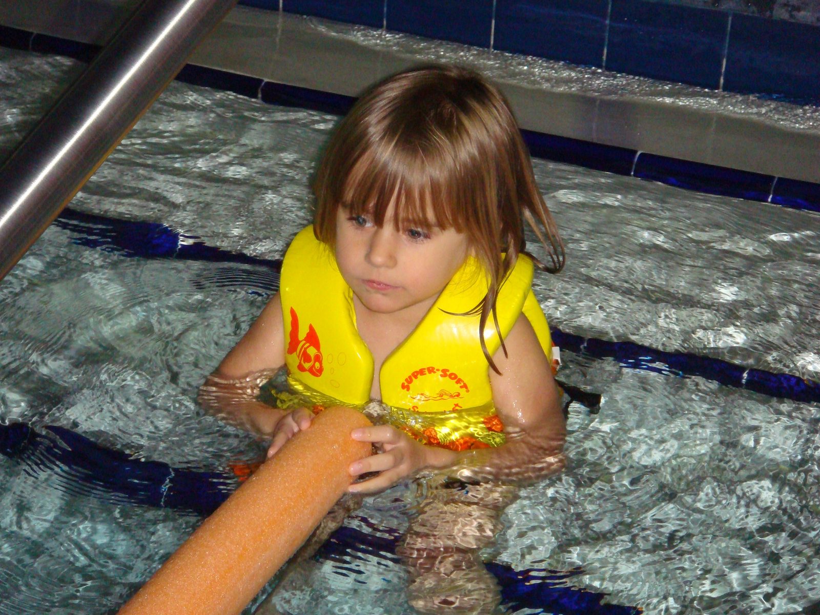 Lisa swimming in the hotel pool