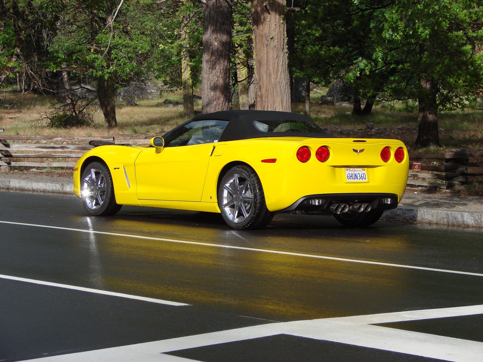 Our yellow Corvette rental winding through Yosemite