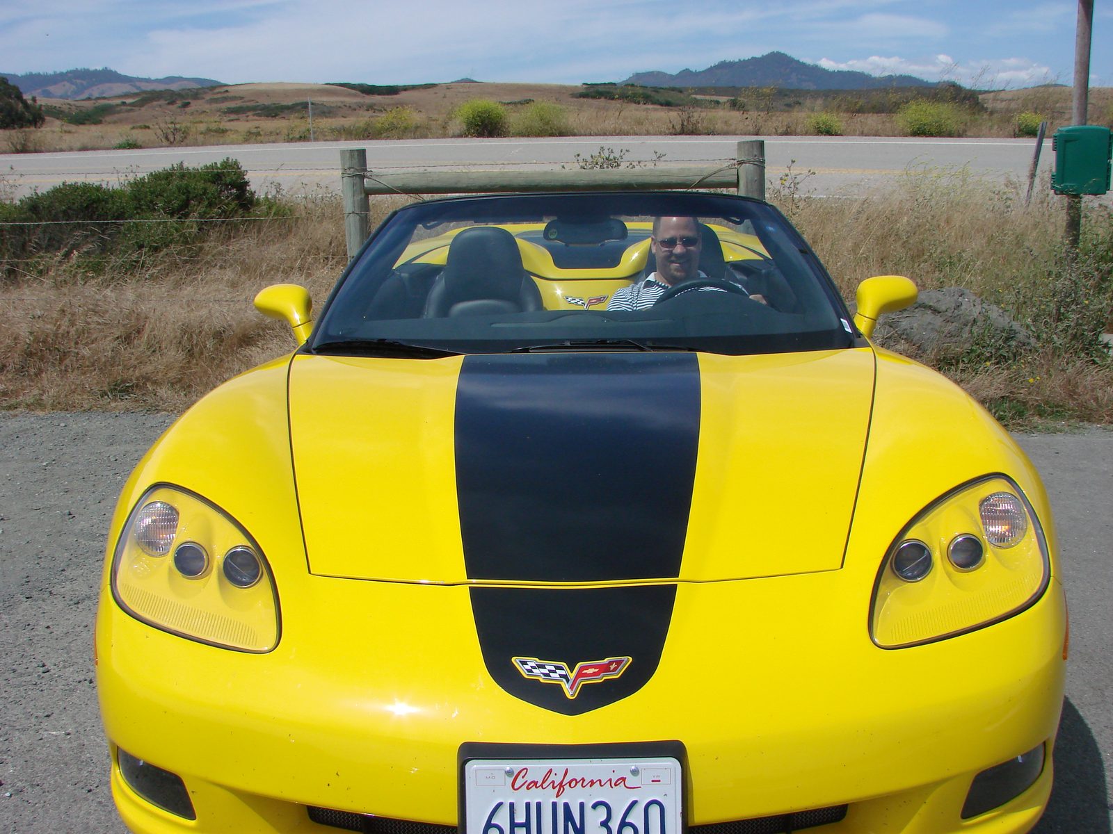 Me driving the Corvette along the Big Sur coast