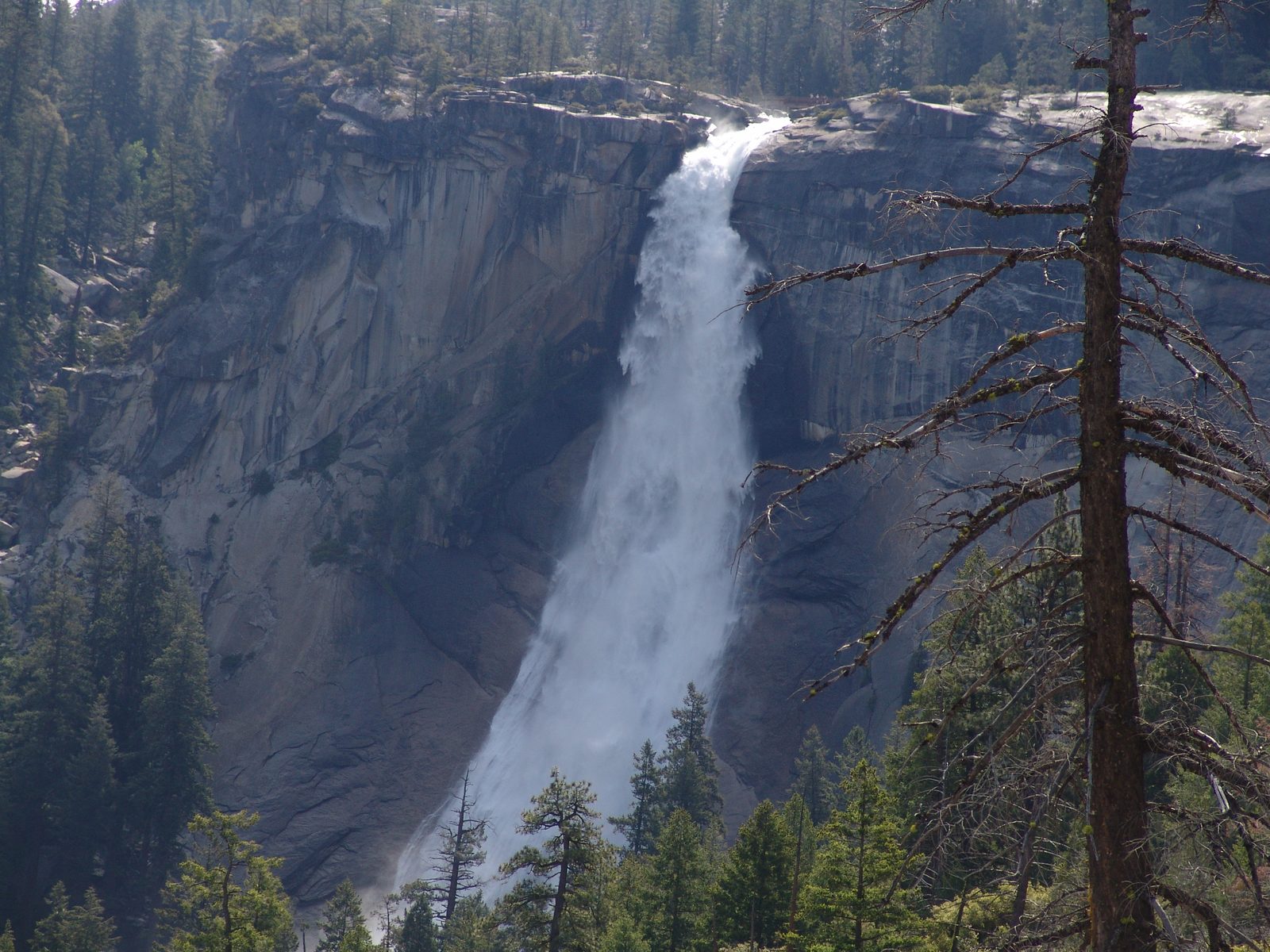 A waterfall across the canyon from the trail
