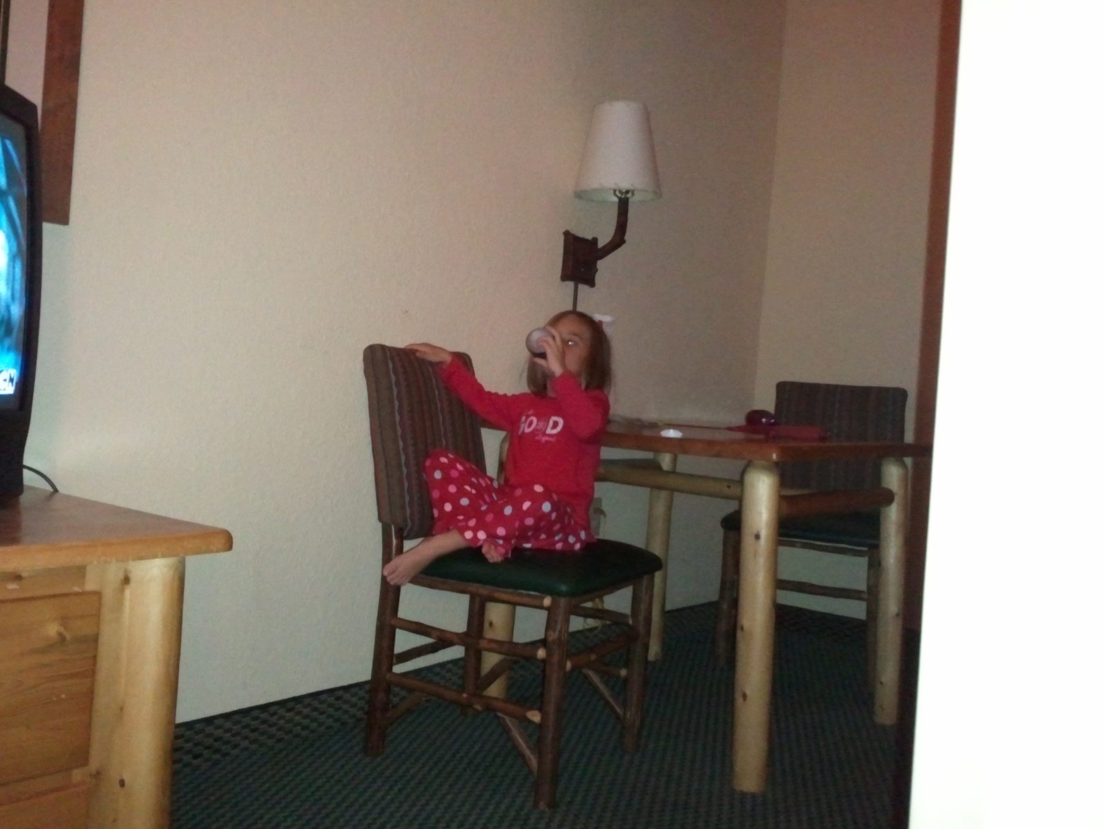 Lisa reaching for the lamp before bed