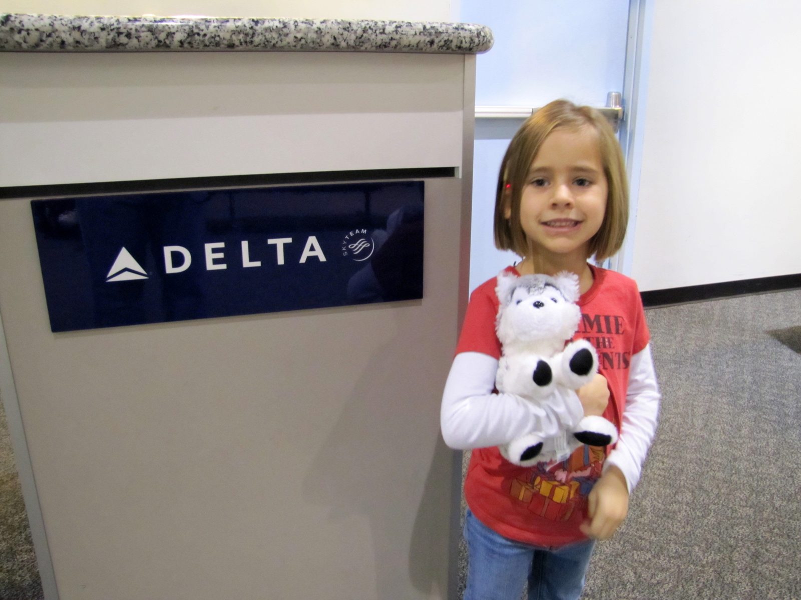 Lisa waiting at the gate with Bob