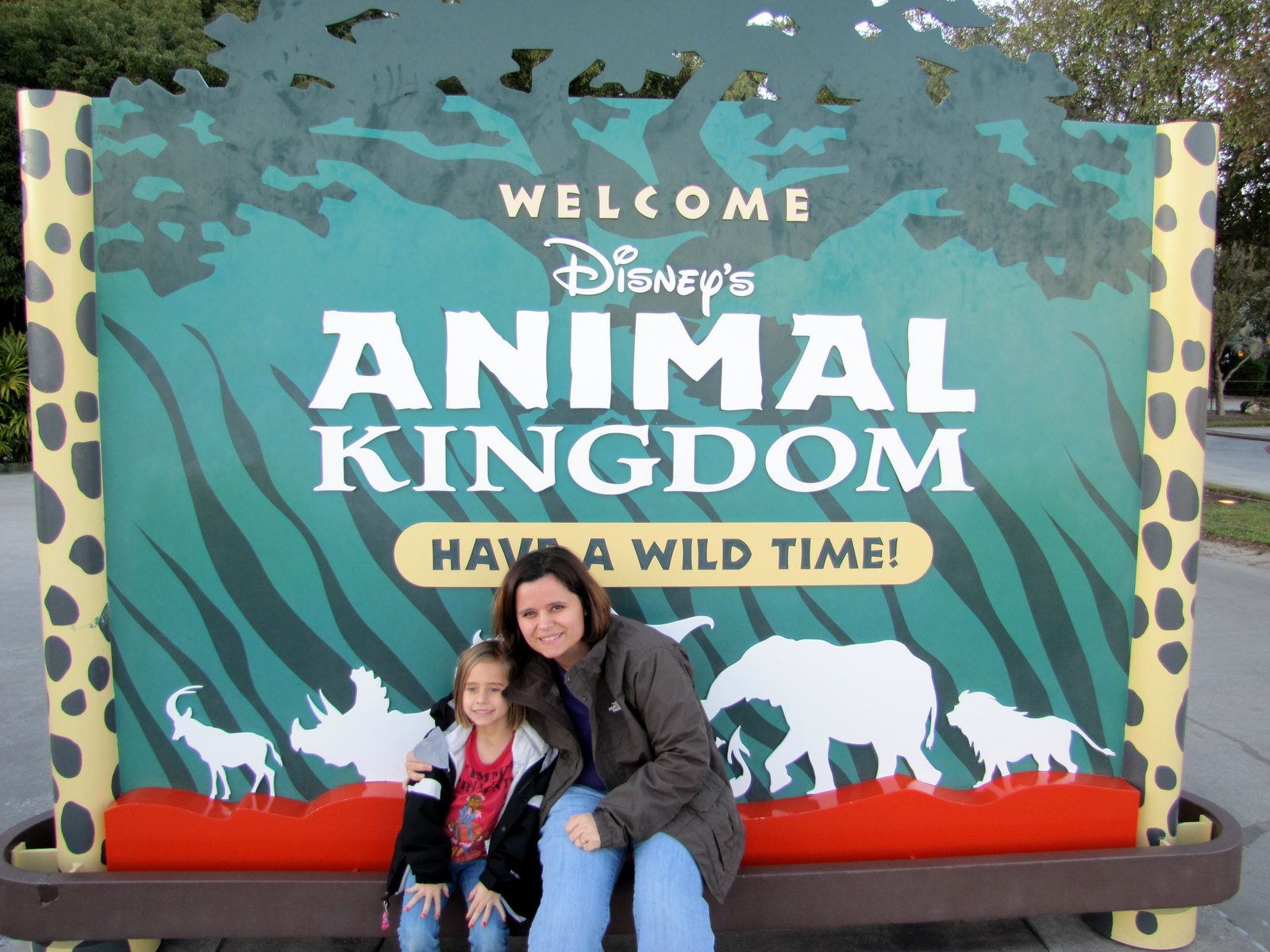 Lisa and Kathy at the Animal Kingdom sign