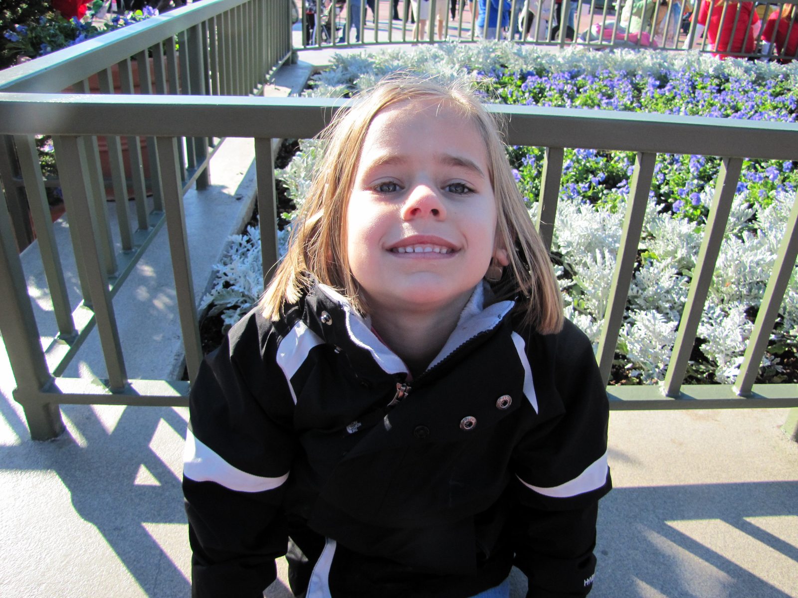 Lisa waiting in the PhotoPass line at the Magic Kingdom