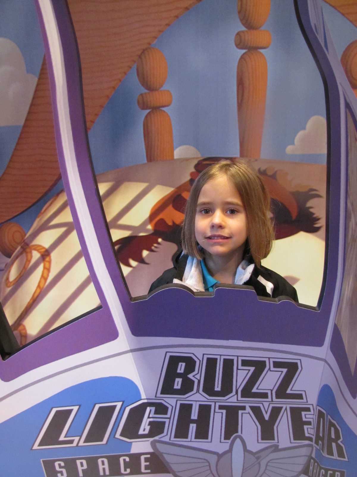Lisa in the Buzz Lightyear cutout while we waited in line