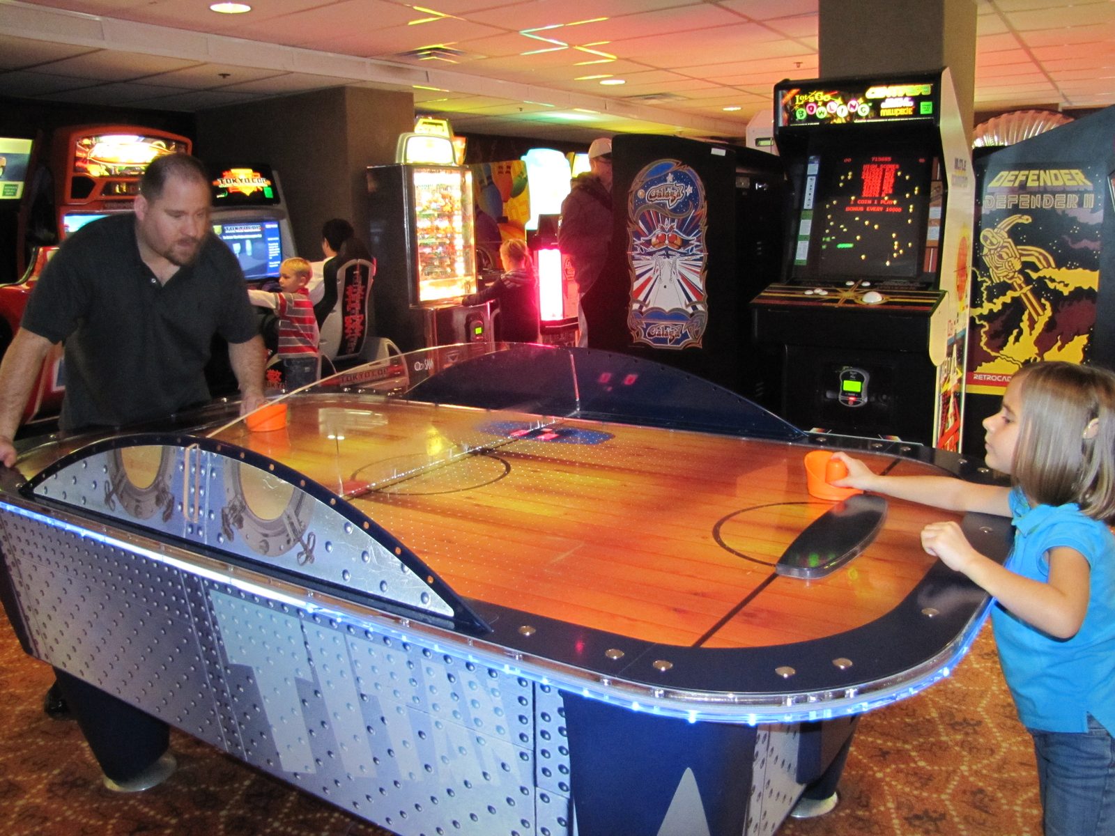 Lisa and Michael battling it out at air hockey