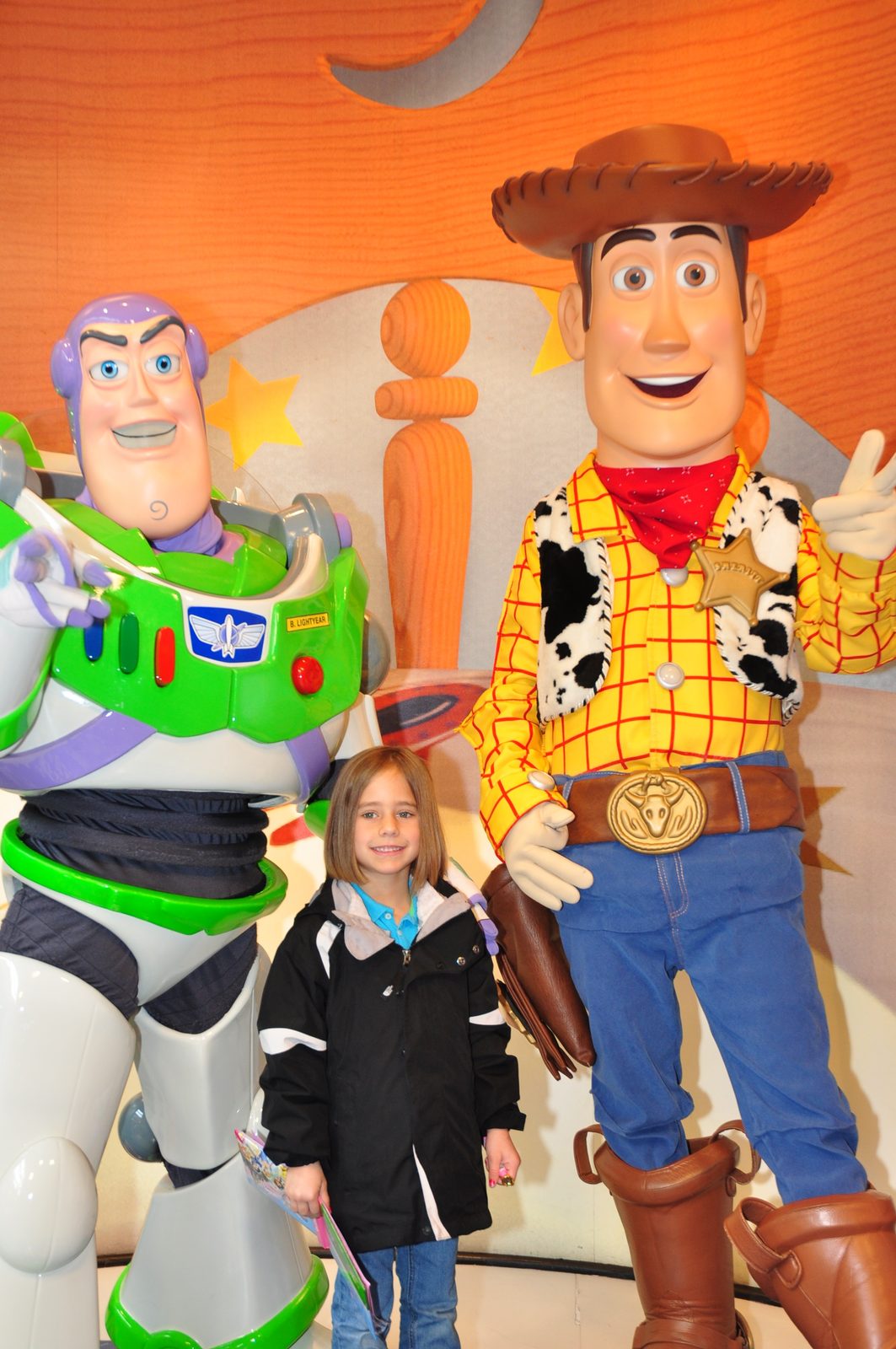 Lisa with Woody and Buzz Lightyear