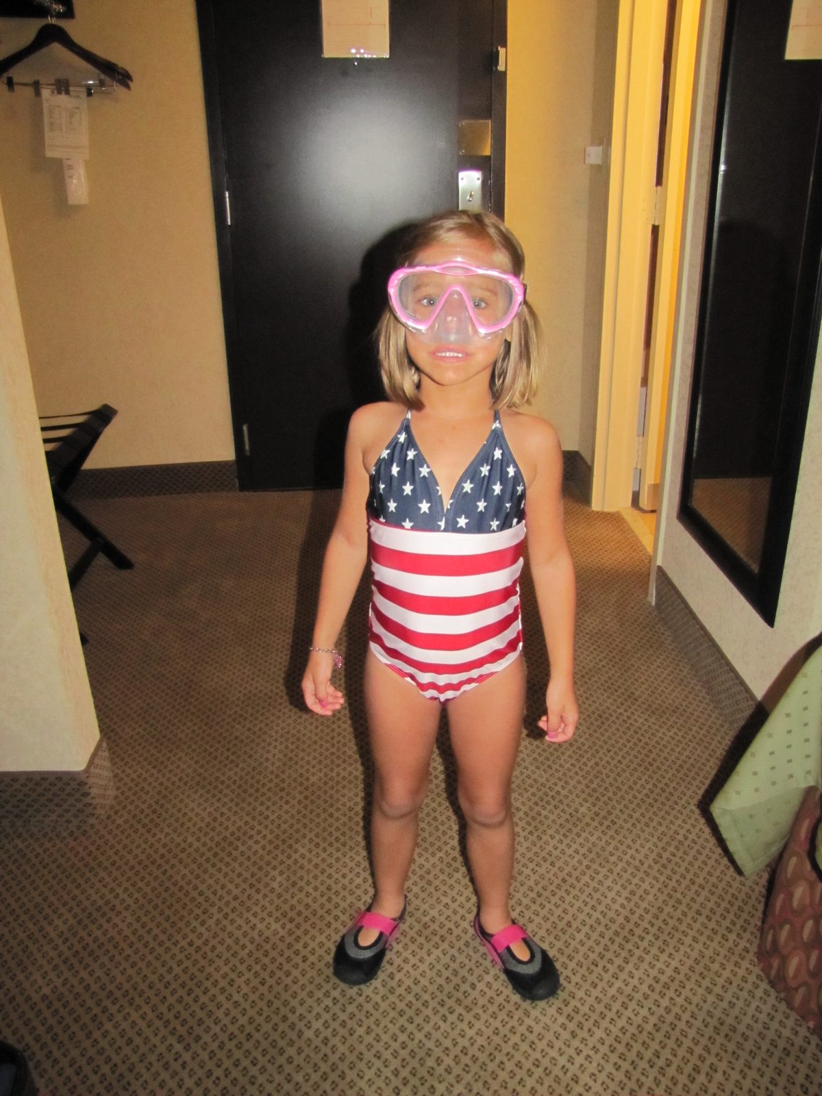 Lisa ready for the pool in her stars and stripes swimsuit