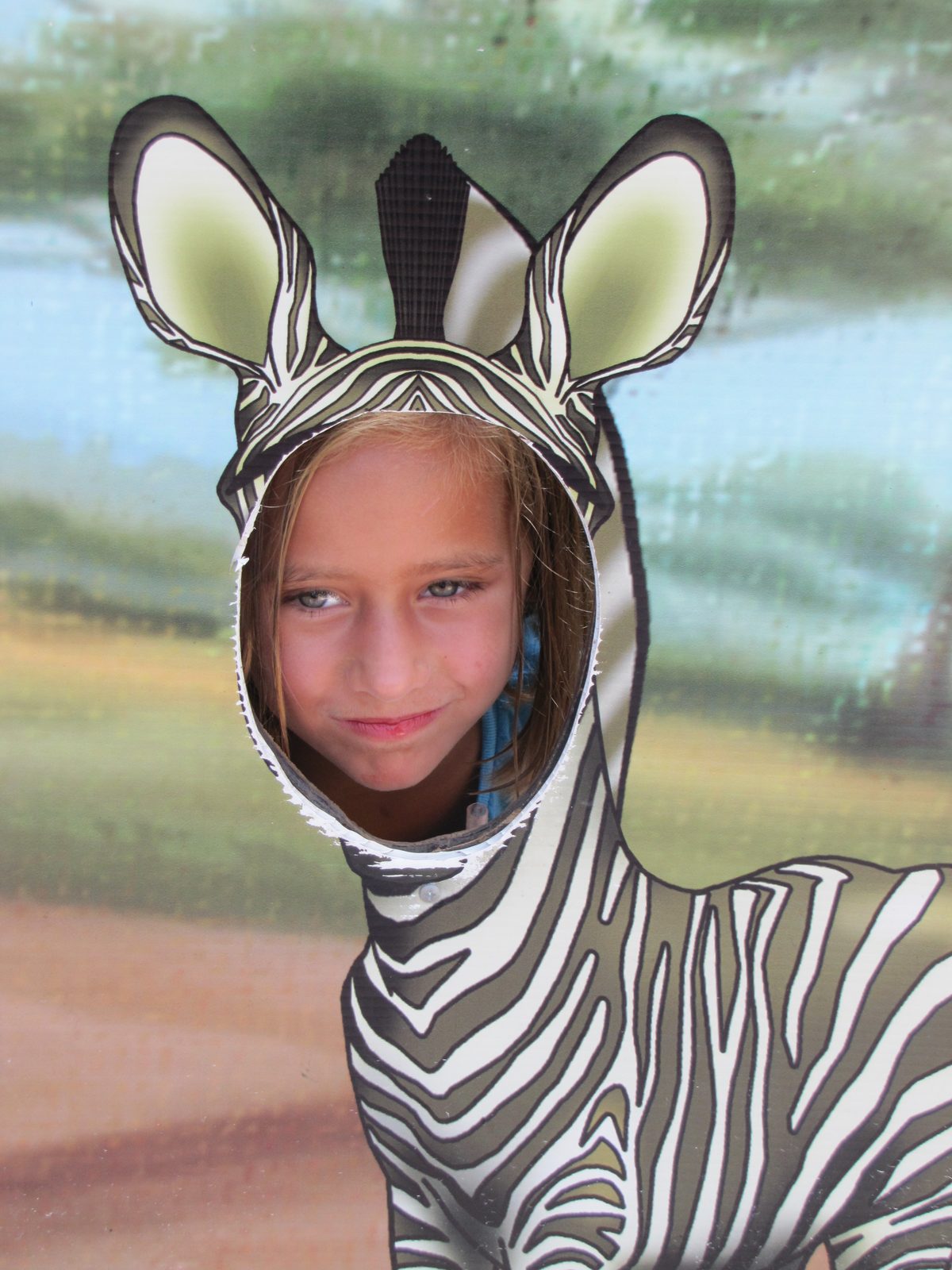 Lisa tries on the zebra cutout