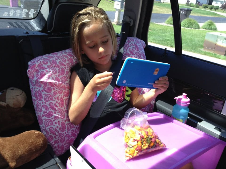 Lisa with her tablet on the drive north