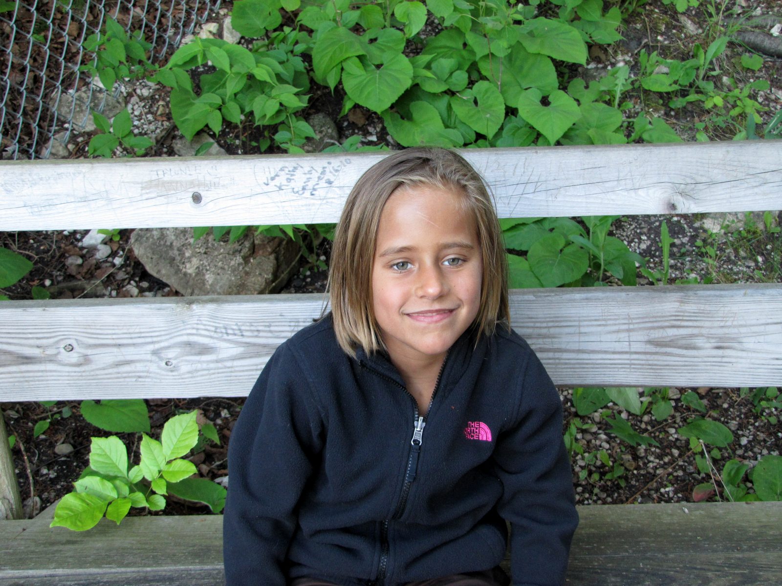 Lisa taking a rest on the bench at Castle Rock