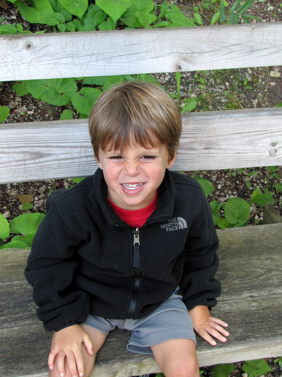 Thomas grinning on the bench at Castle Rock