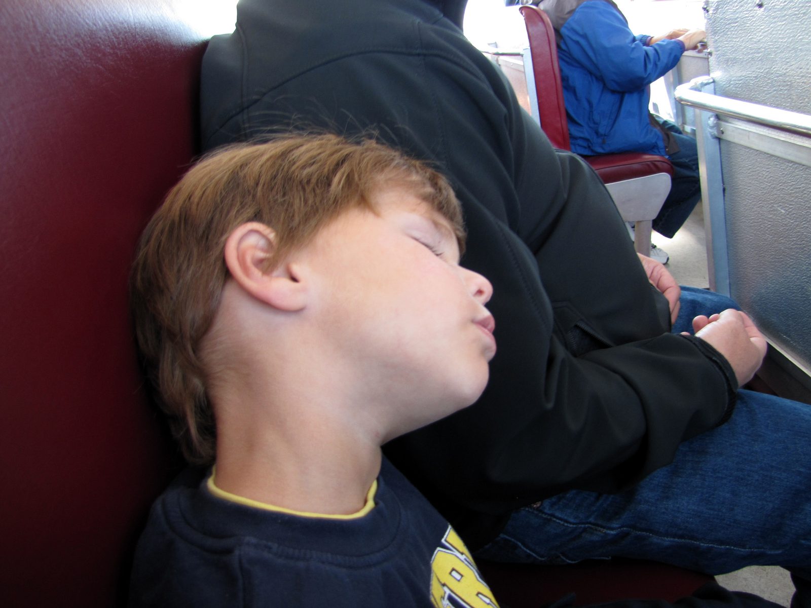 Thomas asleep on the ferry to the island