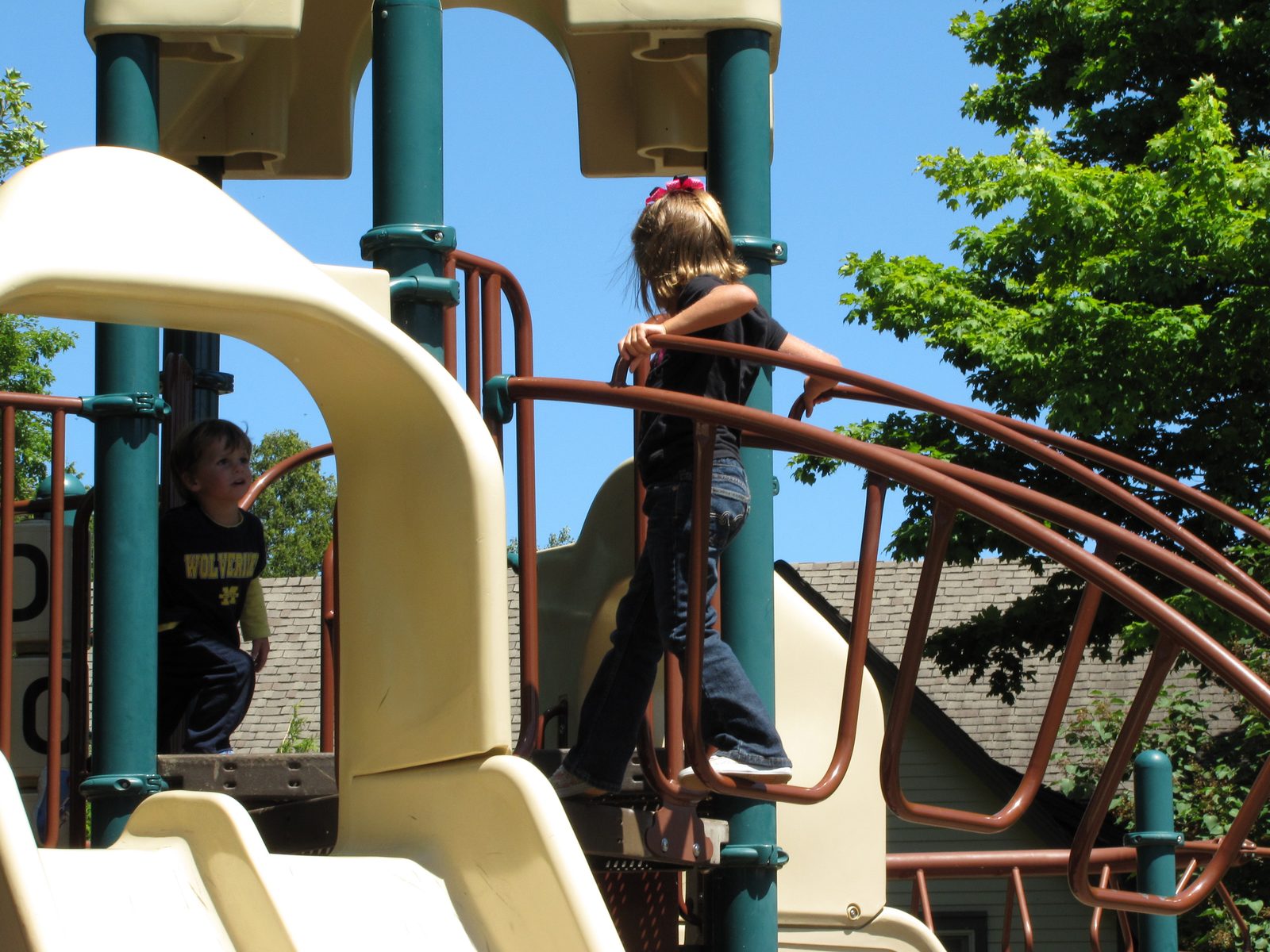 Lisa climbs the playground