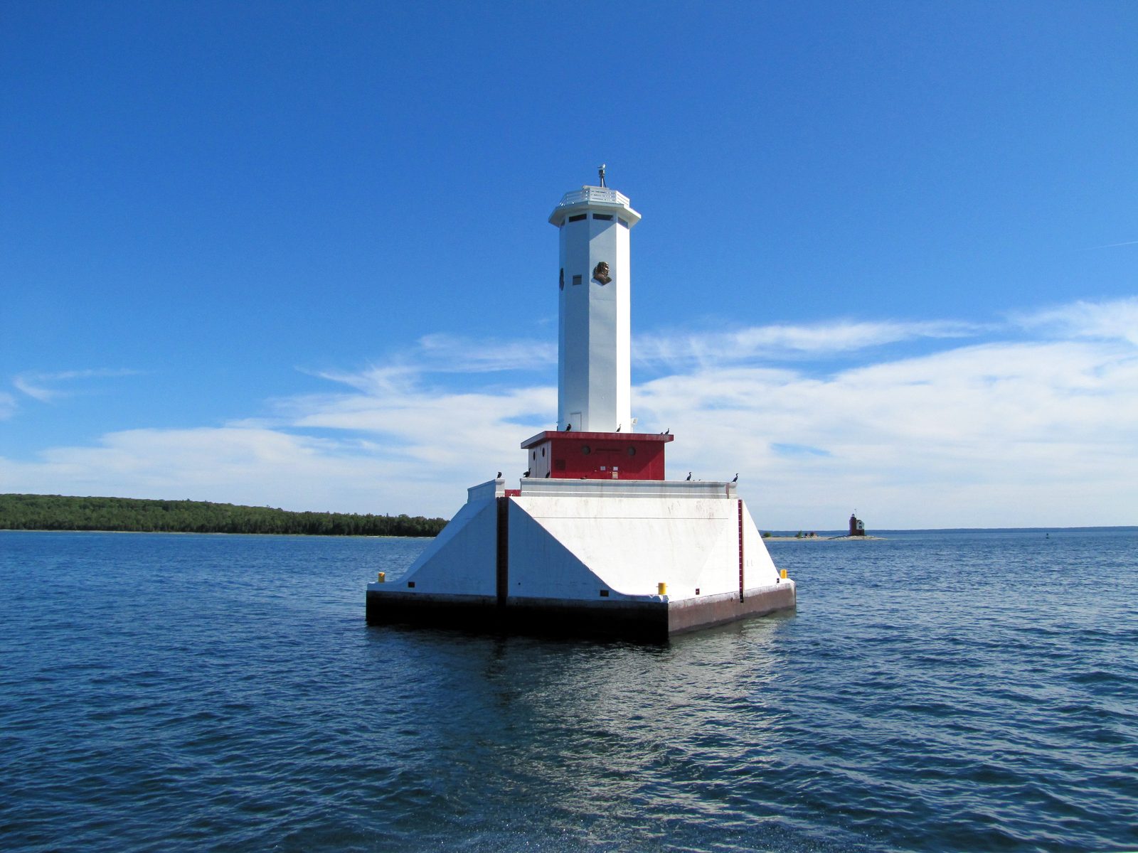 A lighthouse passing by on the ferry back