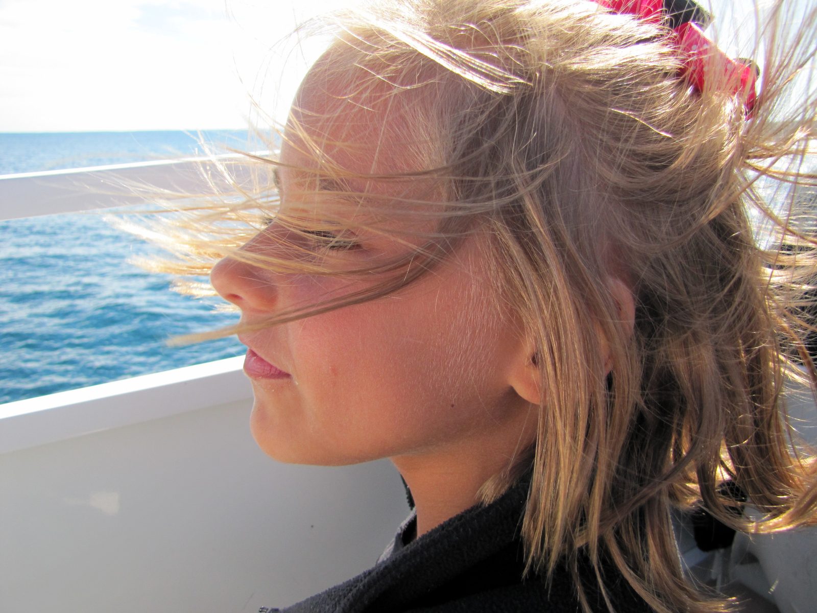 Lisa's hair blowing on the return ferry