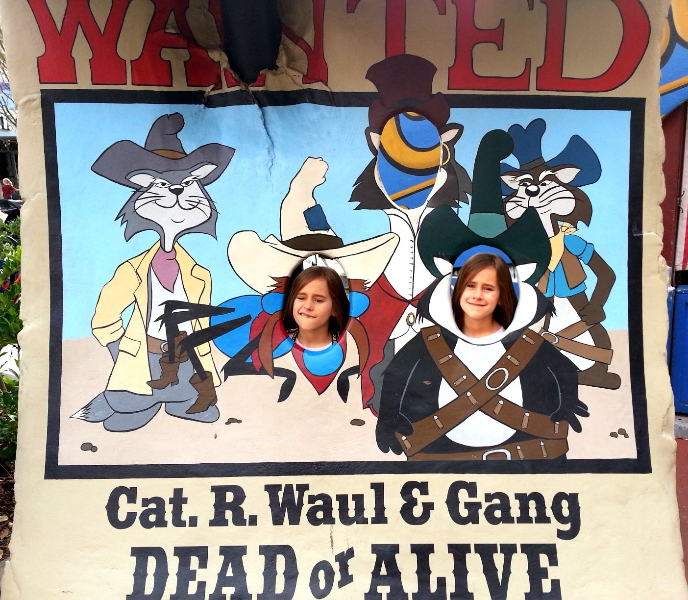 Lisa at the Cat R. Waul wanted poster