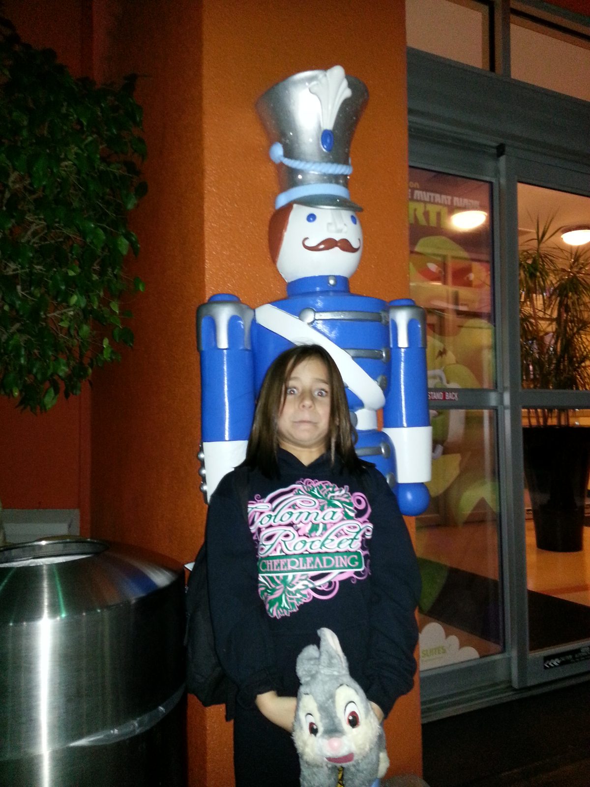 Lisa greeted by the toy soldier out front