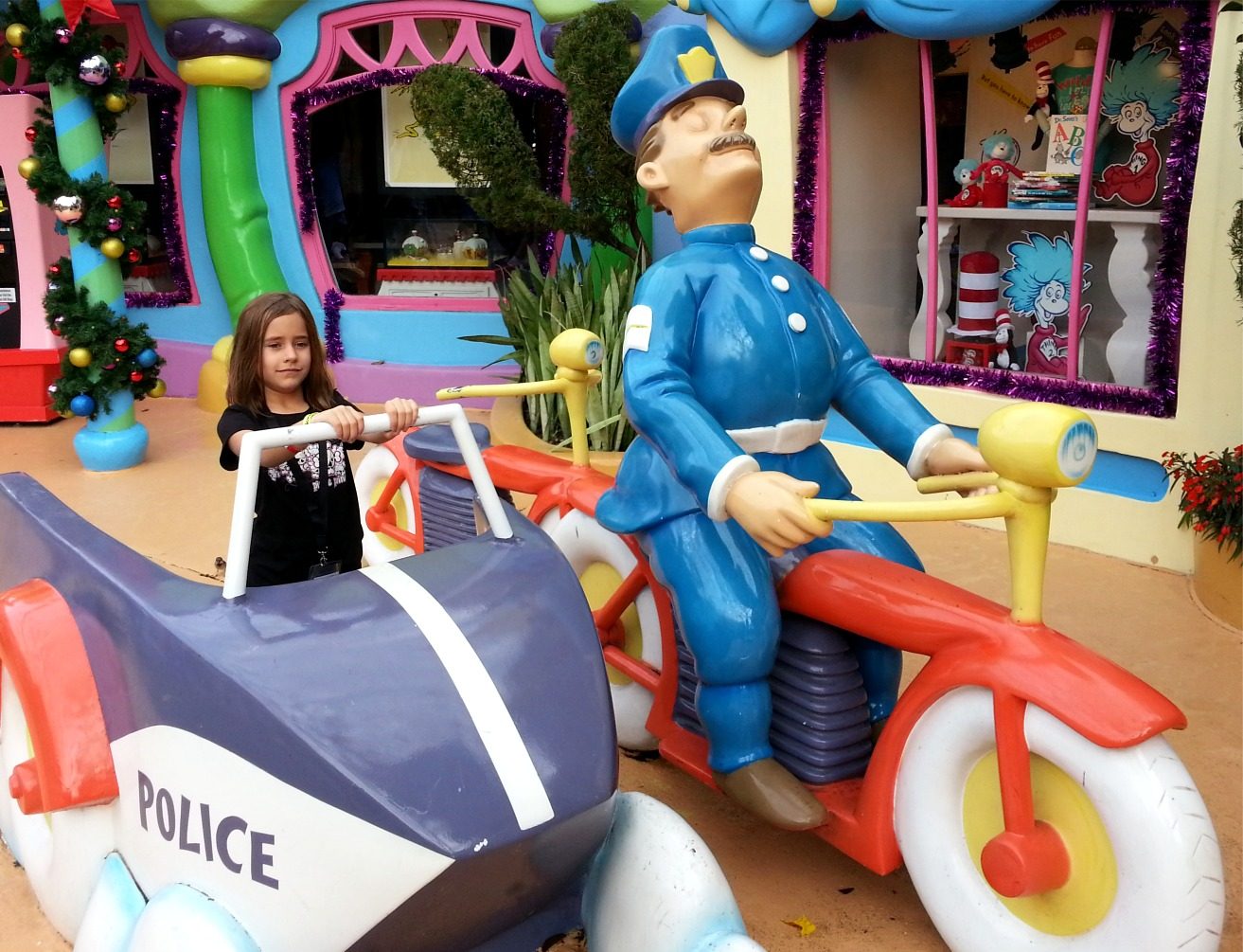 Lisa riding along in the Keystone Kops sidecar