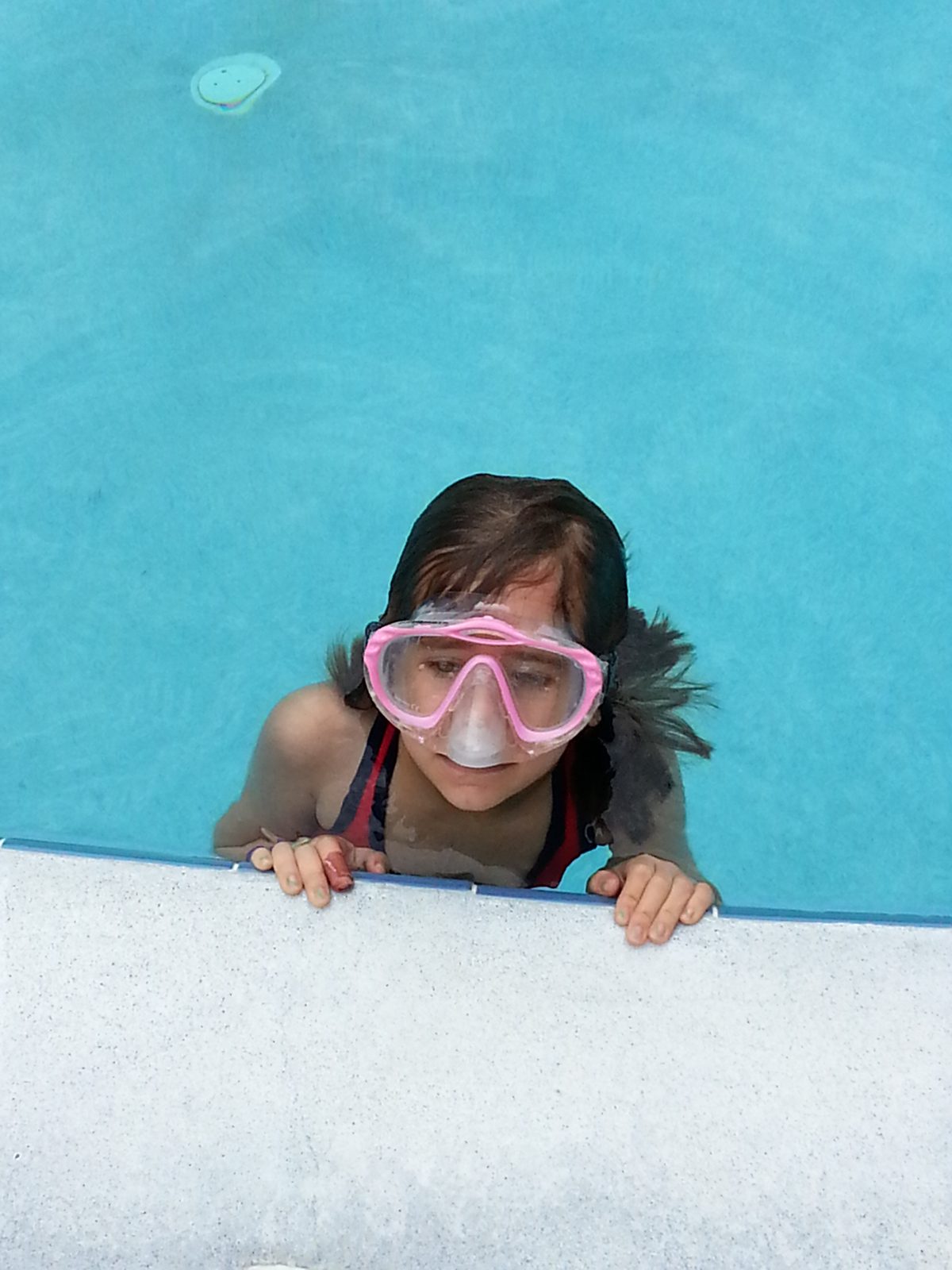 Goggles up for one more morning at the pool